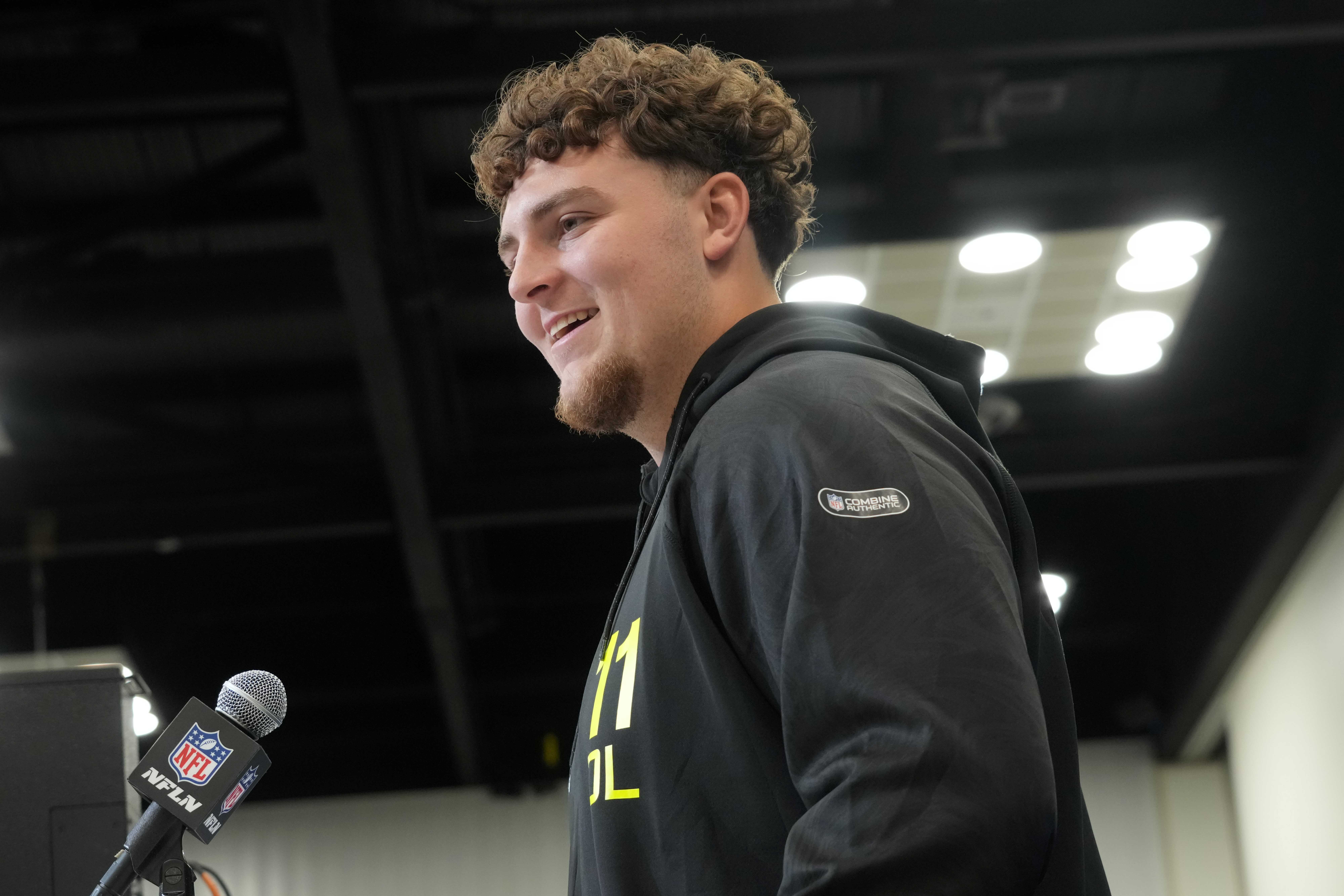 Feb 26, 2025; Indianapolis, IN, USA; Michigan defensive lineman Mason Graham (DL11) during the 2025 NFL Scouting Combine at the Indiana Convention Center.