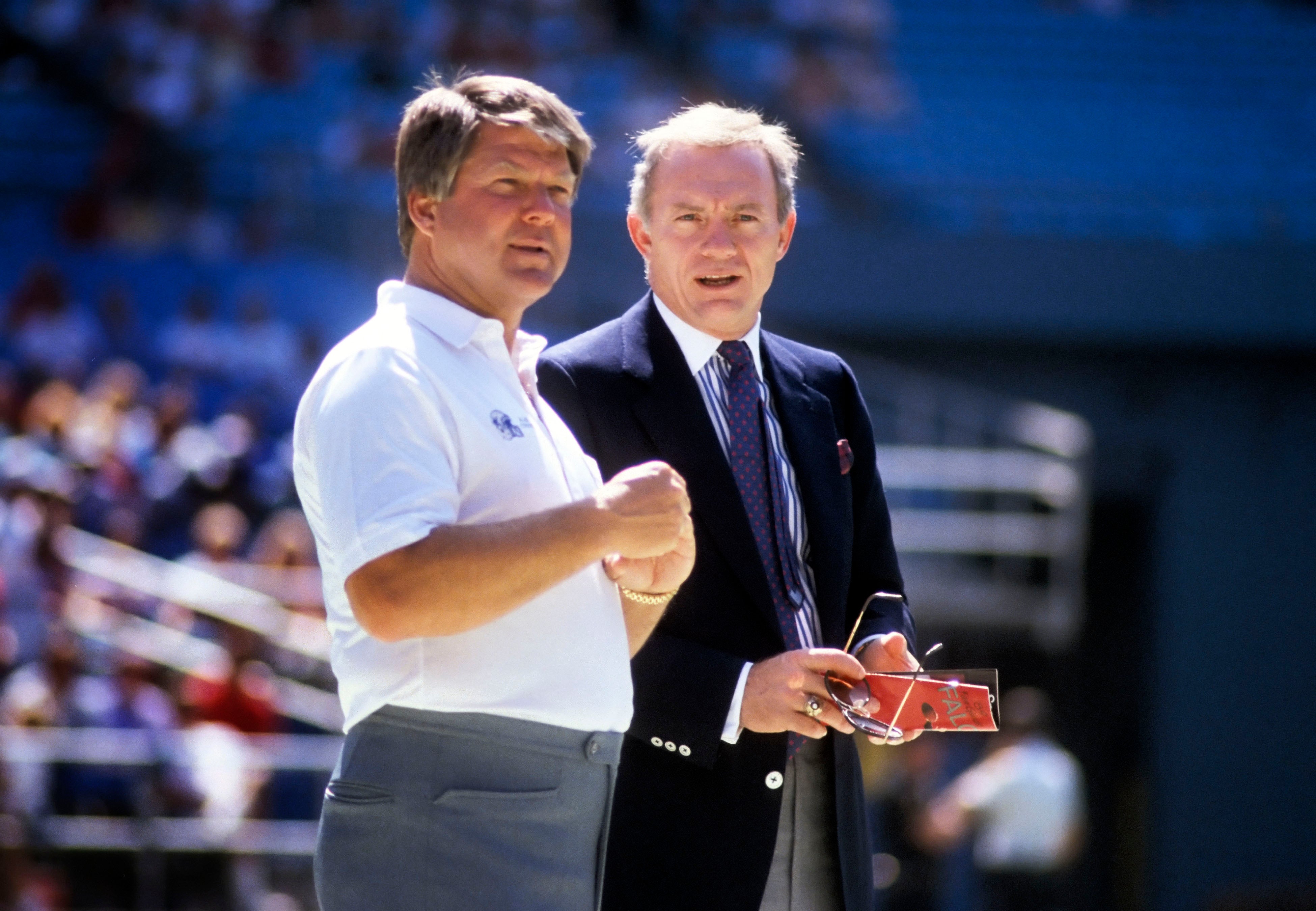 Dallas Cowboys head coach Jimmy Johnson and owner Jerry Jones (right) prior to the game against the Atlanta Falcons at Fulton County Stadium.