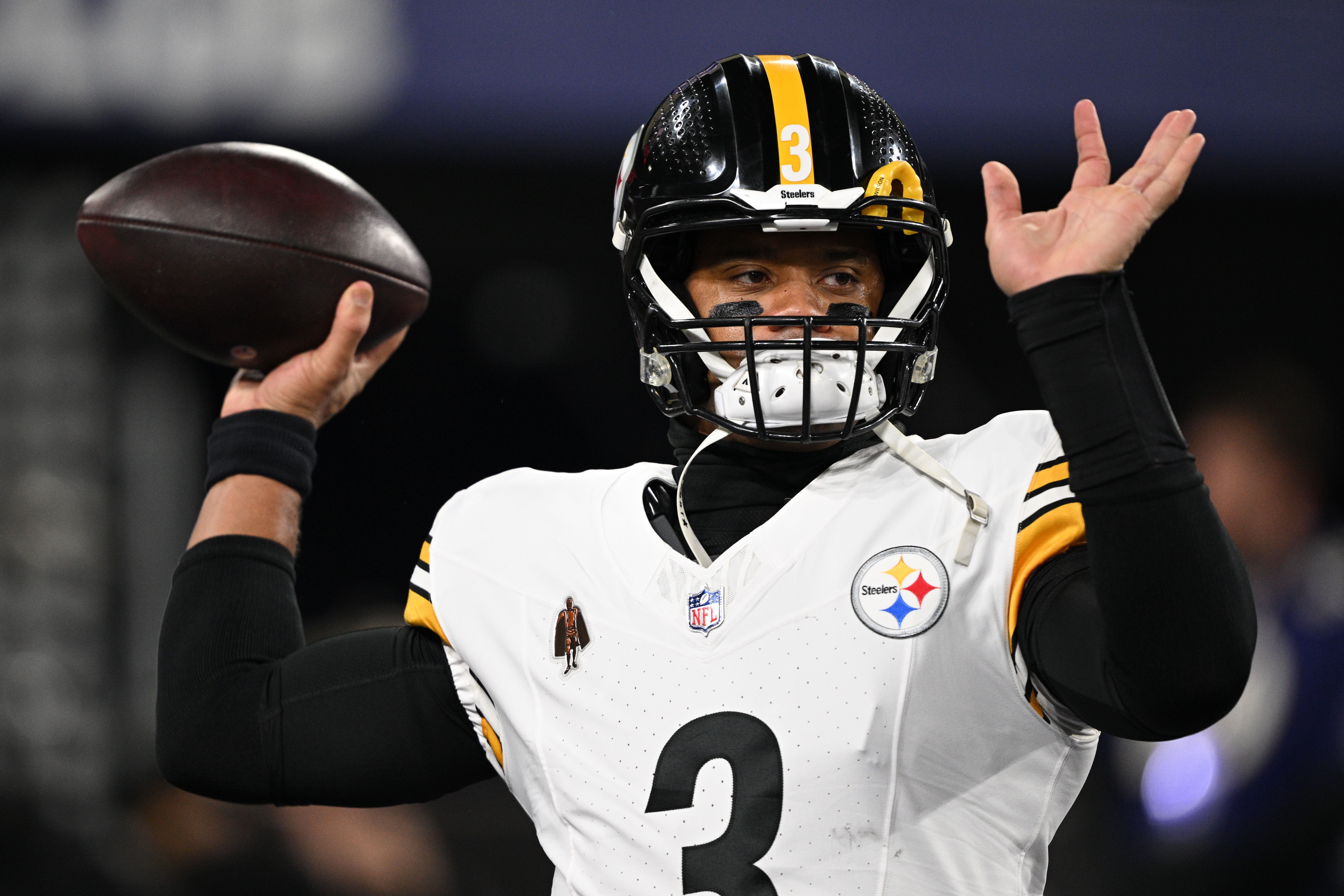 Jan 11, 2025; Baltimore, Maryland, USA; Pittsburgh Steelers quarterback Russell Wilson (3) warms up before an AFC wild card game against the Baltimore Ravens at M&T Bank Stadium.