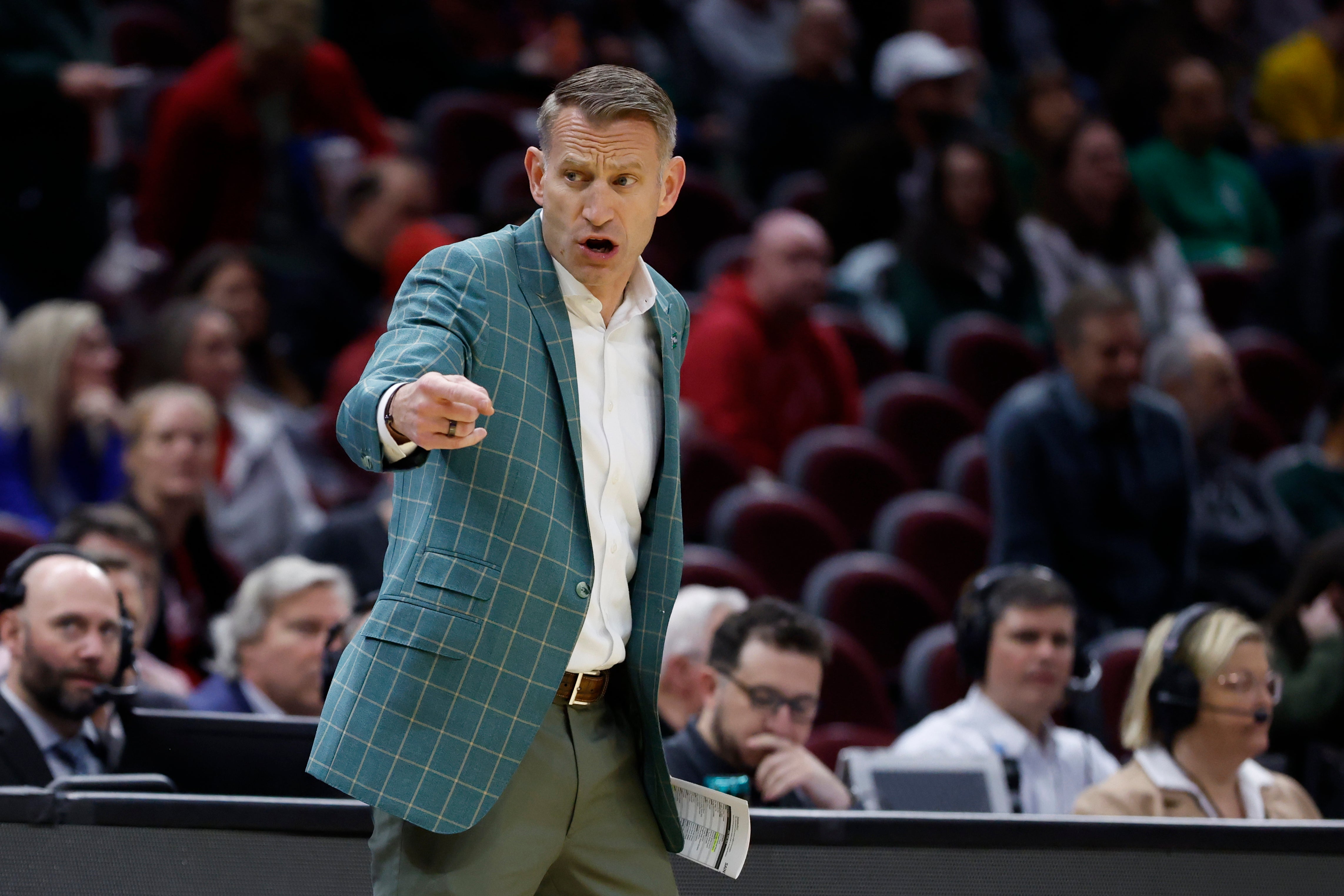 Mar 23, 2025; Cleveland, OH, USA; Alabama Crimson Tide head coach Nate Oats coaches in the first half against the St. Mary's Gaels during the NCAA Tournament Second Round at Rocket Arena.