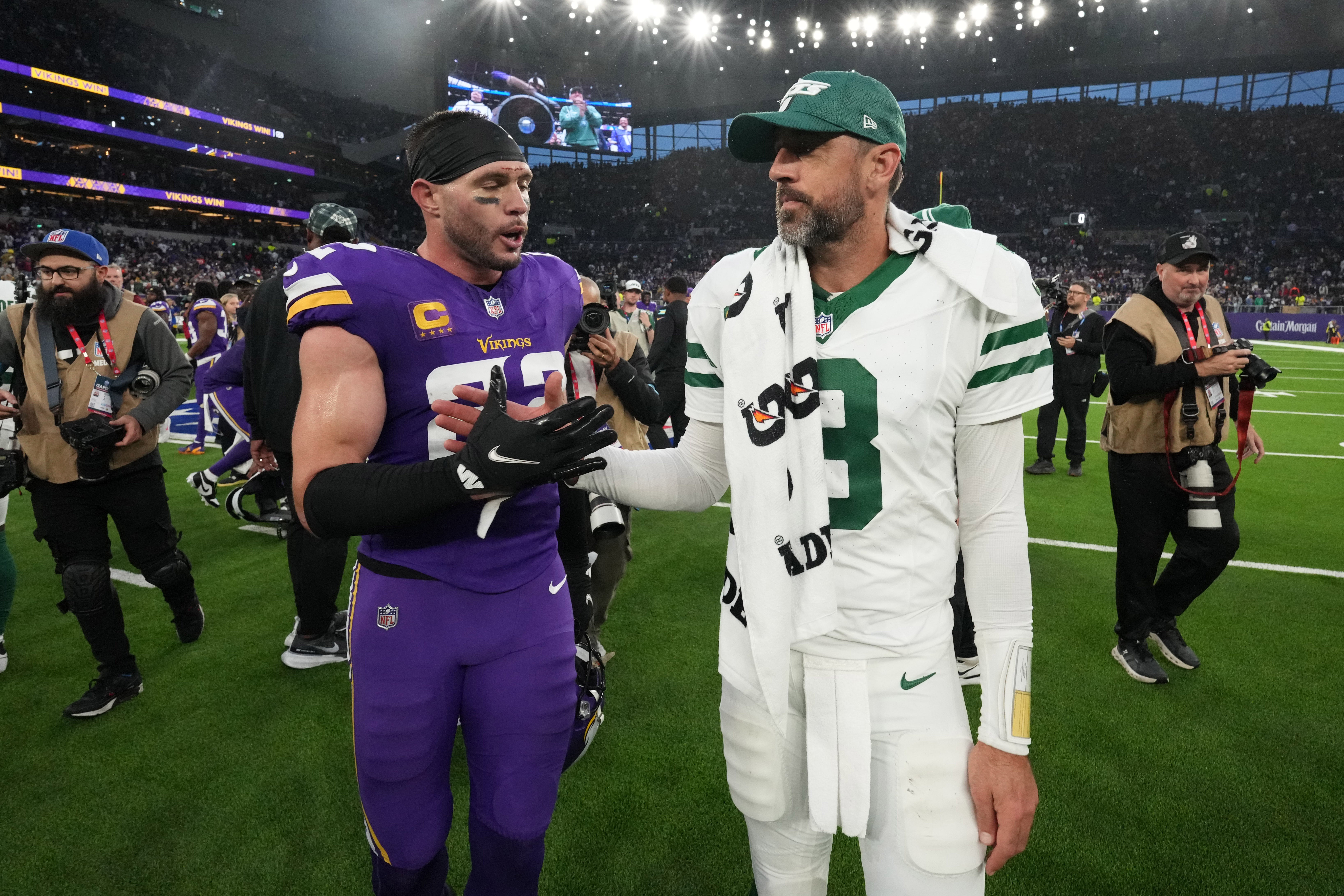 Oct 6, 2024; London, United Kingdom; New York Jets quarterback Aaron Rodgers (8) shakes hands with Minnesota Vikings safety Harrison Smith (22) after the game at Tottenham Hotspur Stadium.
