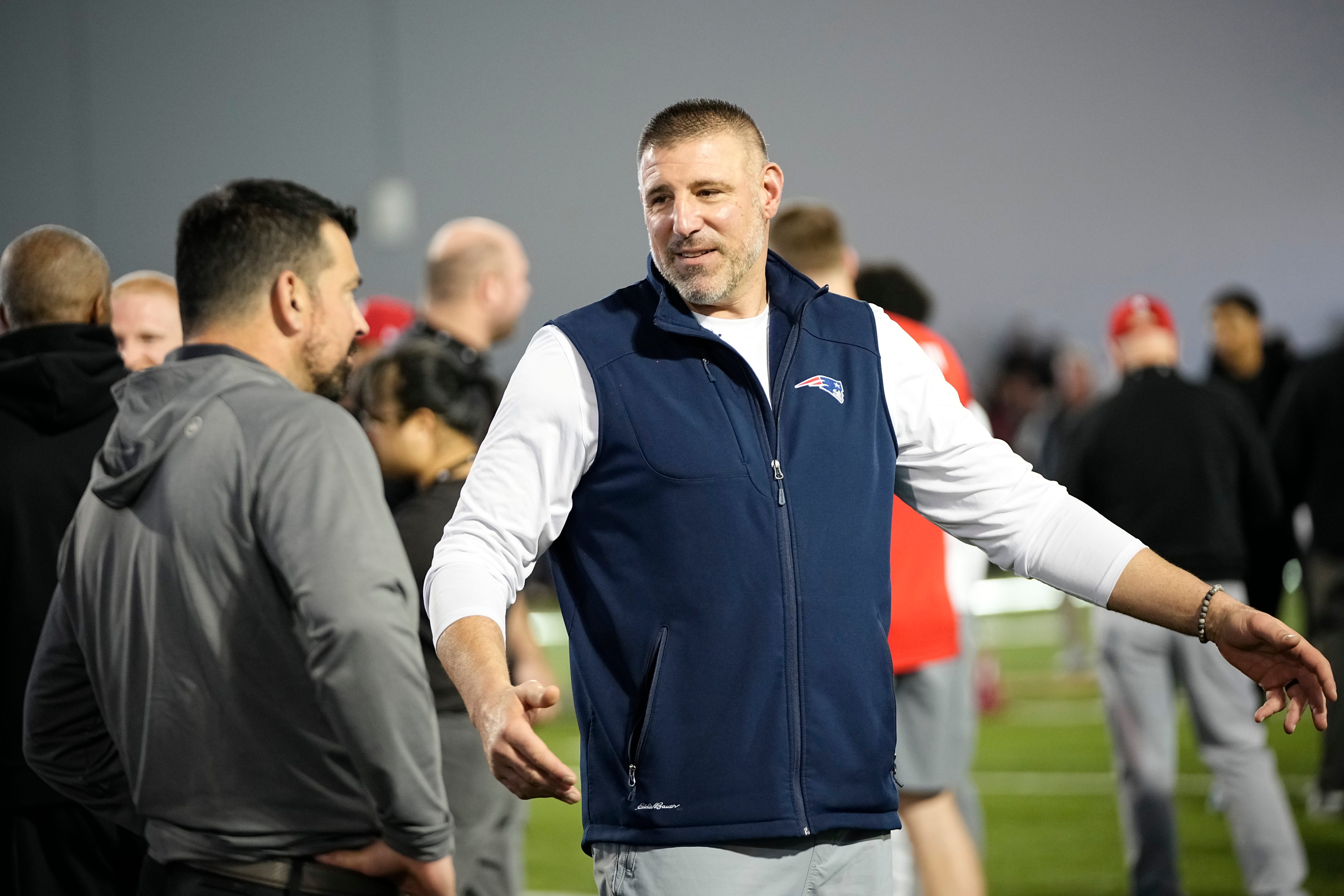 Ohio State Buckeyes head coach Ryan Day talks to New Englandf Patriots head coach Mike Vrabel during the pro day for NFL scouts at the Woody Hayes Athletic Cente on March 26, 2025.