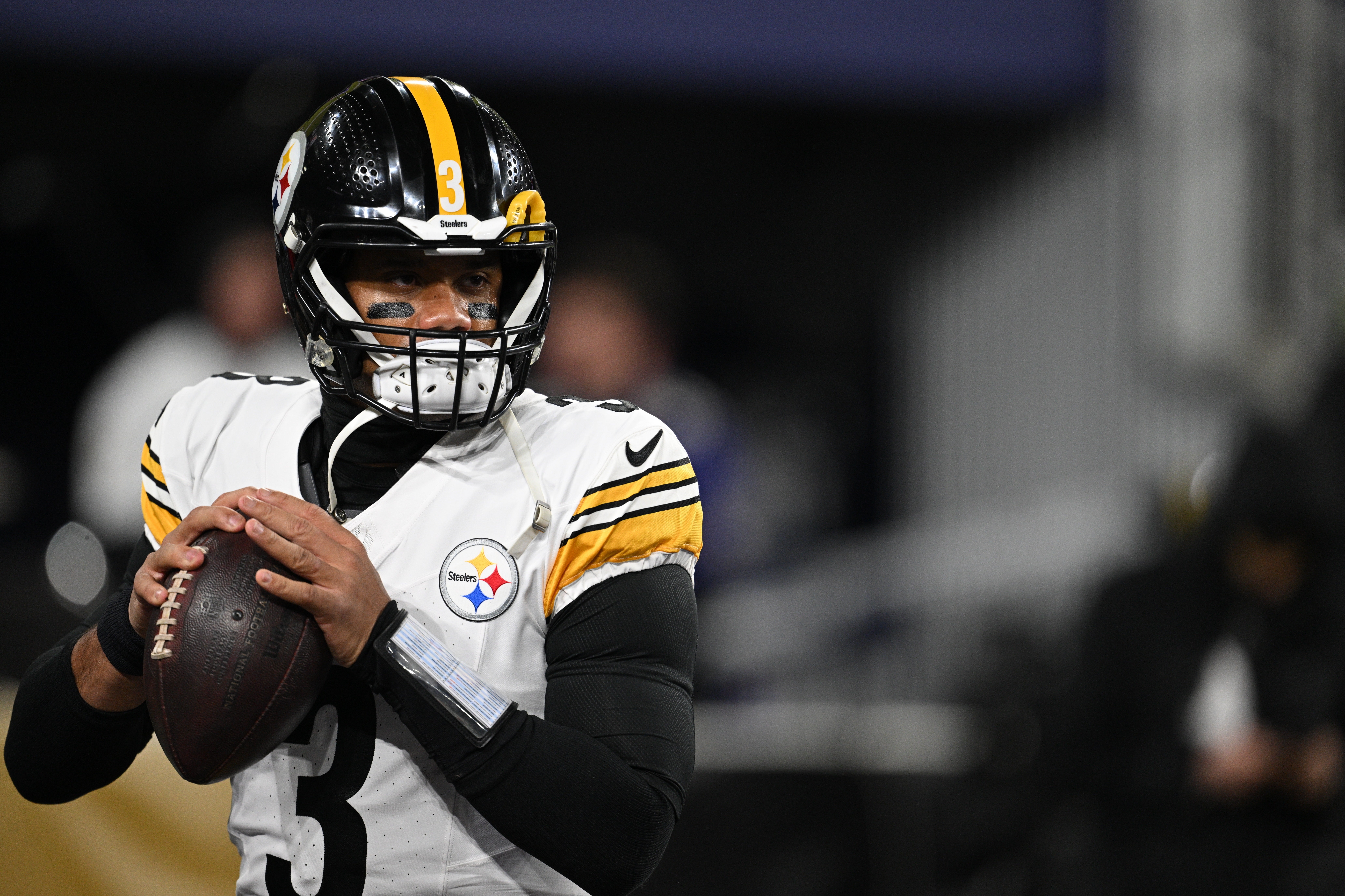 Pittsburgh Steelers quarterback Russell Wilson (3) warms up before an AFC wild card game against the Baltimore Ravens at M&T Bank Stadium