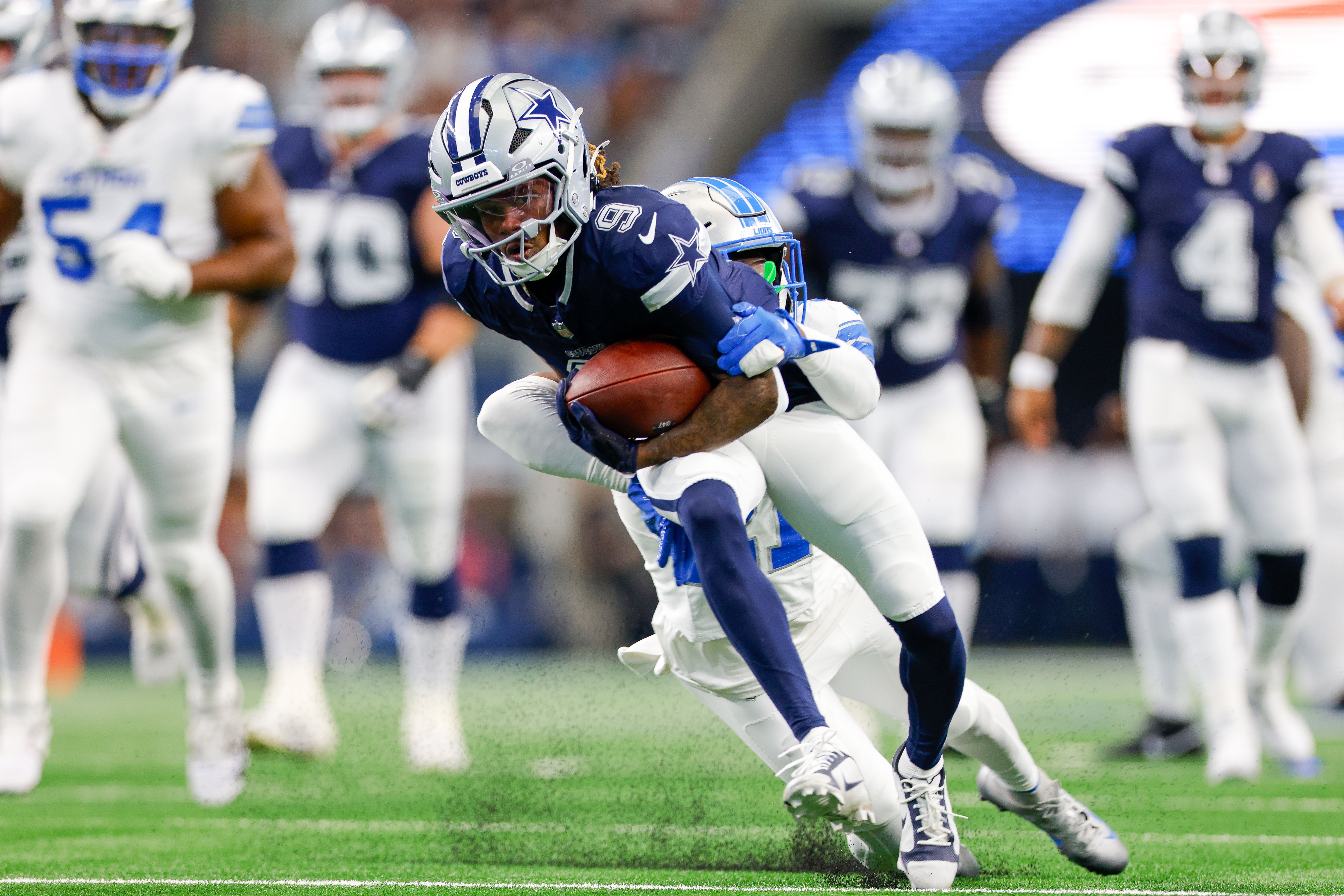 Dallas Cowboys wide receiver KaVontae Turpin (9) is tackled by Detroit Lions cornerback Amik Robertson (21) during the first quarter at AT&T Stadium.