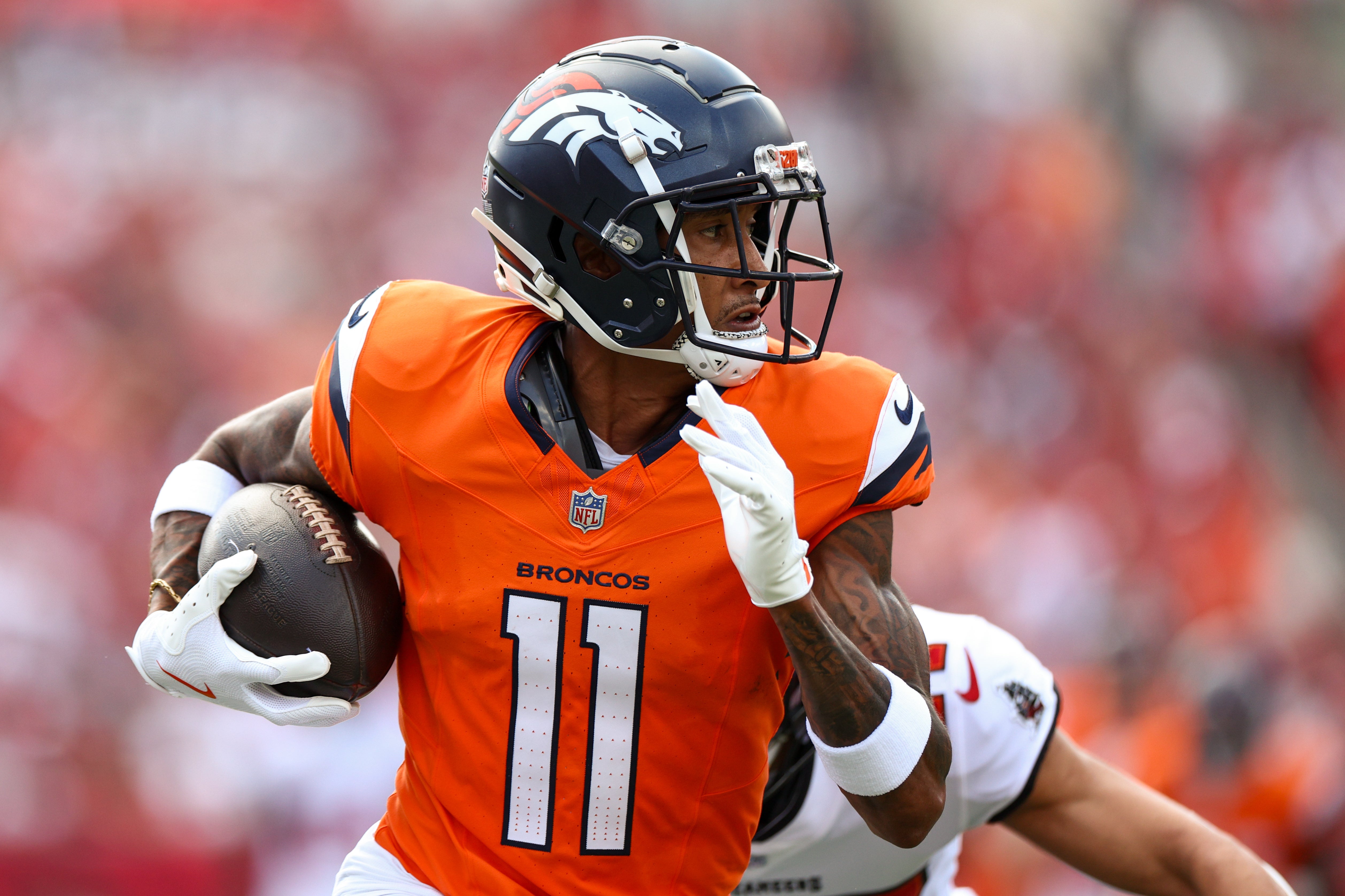 Denver Broncos wide receiver Josh Reynolds (11) makes a catch against the Tampa Bay Buccaneers in the first quarter at Raymond James Stadium.