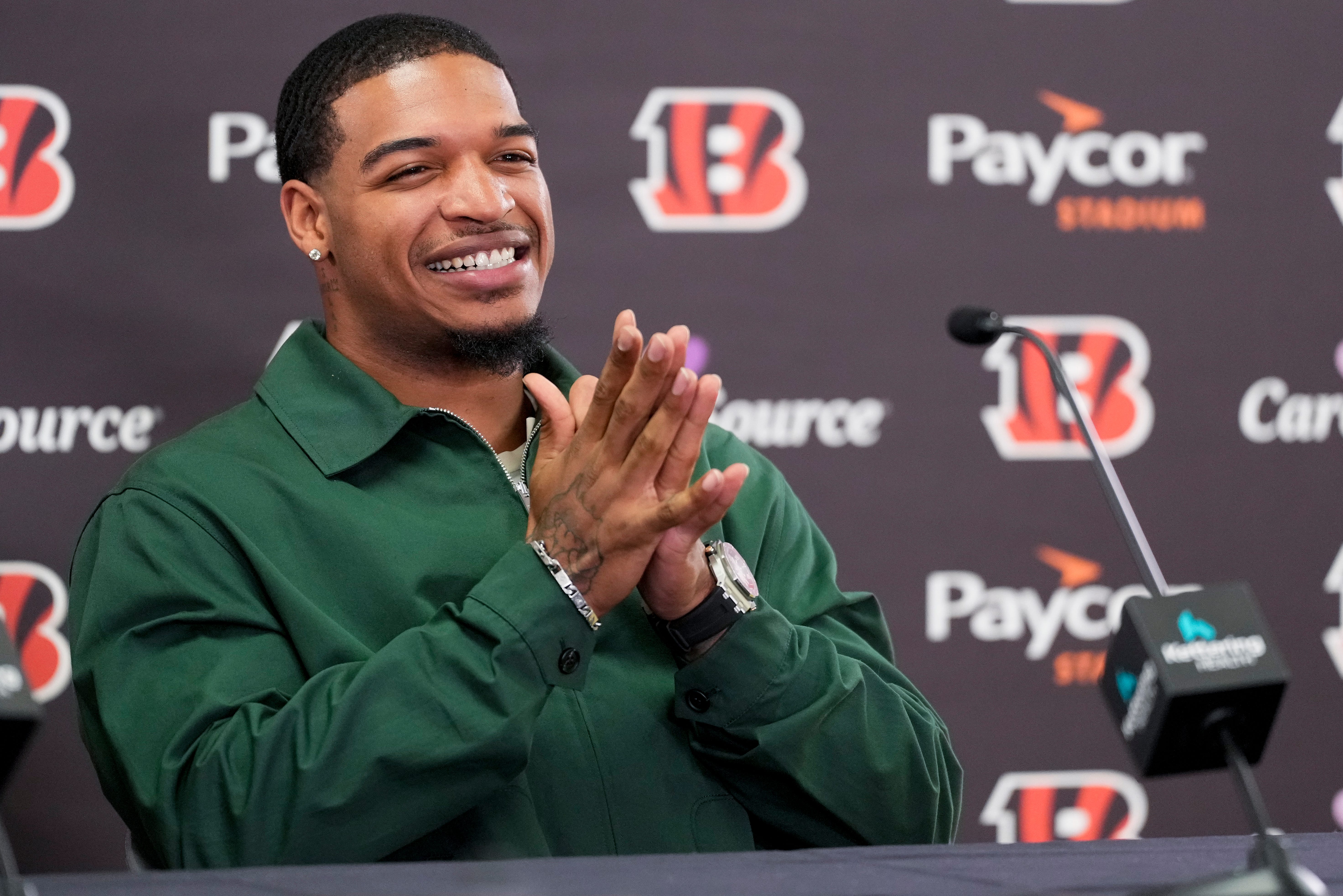 Cincinnati Bengals receiver Ja’marr Chase smiles as he takes questions during a press conference to announce the signing of new contracts for receivers Ja’Marr Chase and Tee Higgins at Paycor Stadium in downtown Cincinnati on Tuesday, March 18, 2025. Chase becomes the new highest-paid non-quarterback player in the NFL.