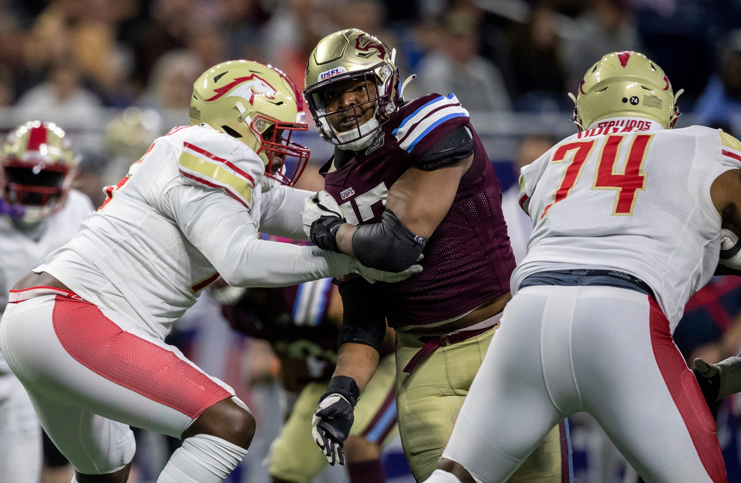 Michigan Panthers' Breeland Speaks (57) rushes two offensive linemen during a game against the Birmingham Stallions at Ford Field in Detroit on Saturday, May 20, 2023.