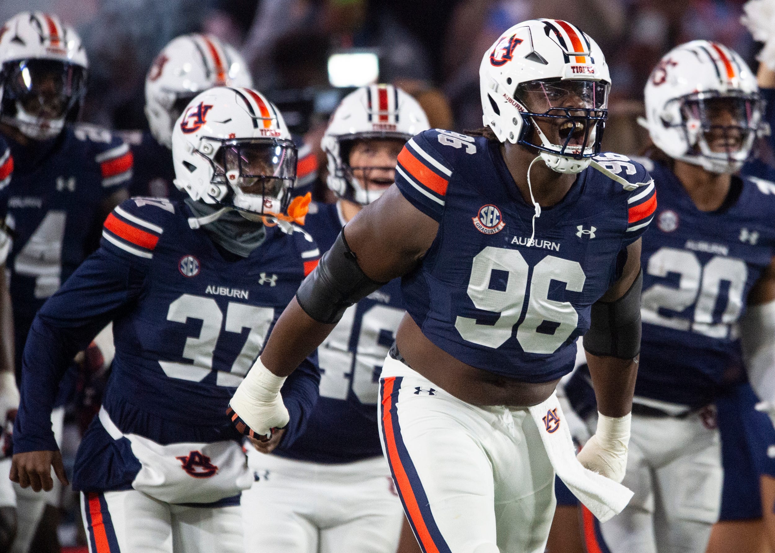 Auburn Tigers defensive lineman Philip Blidi (96) leads his team onto the field as Auburn Tigers take on Texas A&M Aggies at Jordan-Hare Stadium in Auburn, Ala., on Saturday, Sept. 7, 2024.