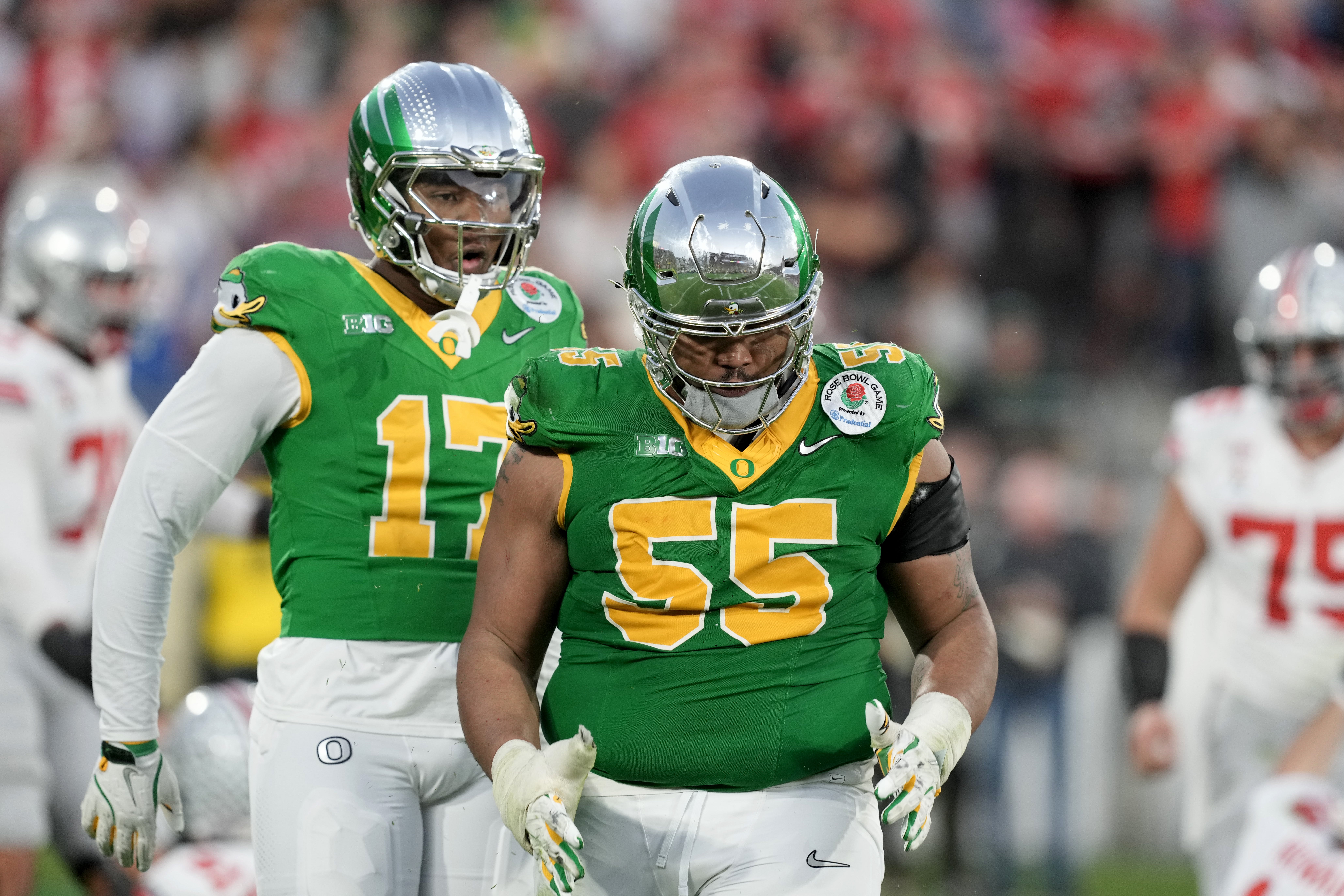 Jan 1, 2025; Pasadena, CA, USA; Oregon Ducks defensive lineman Derrick Harmon (55) reacts in the second half against the Ohio State Buckeyes in the 2025 Rose Bowl college football quarterfinal game at Rose Bowl Stadium.