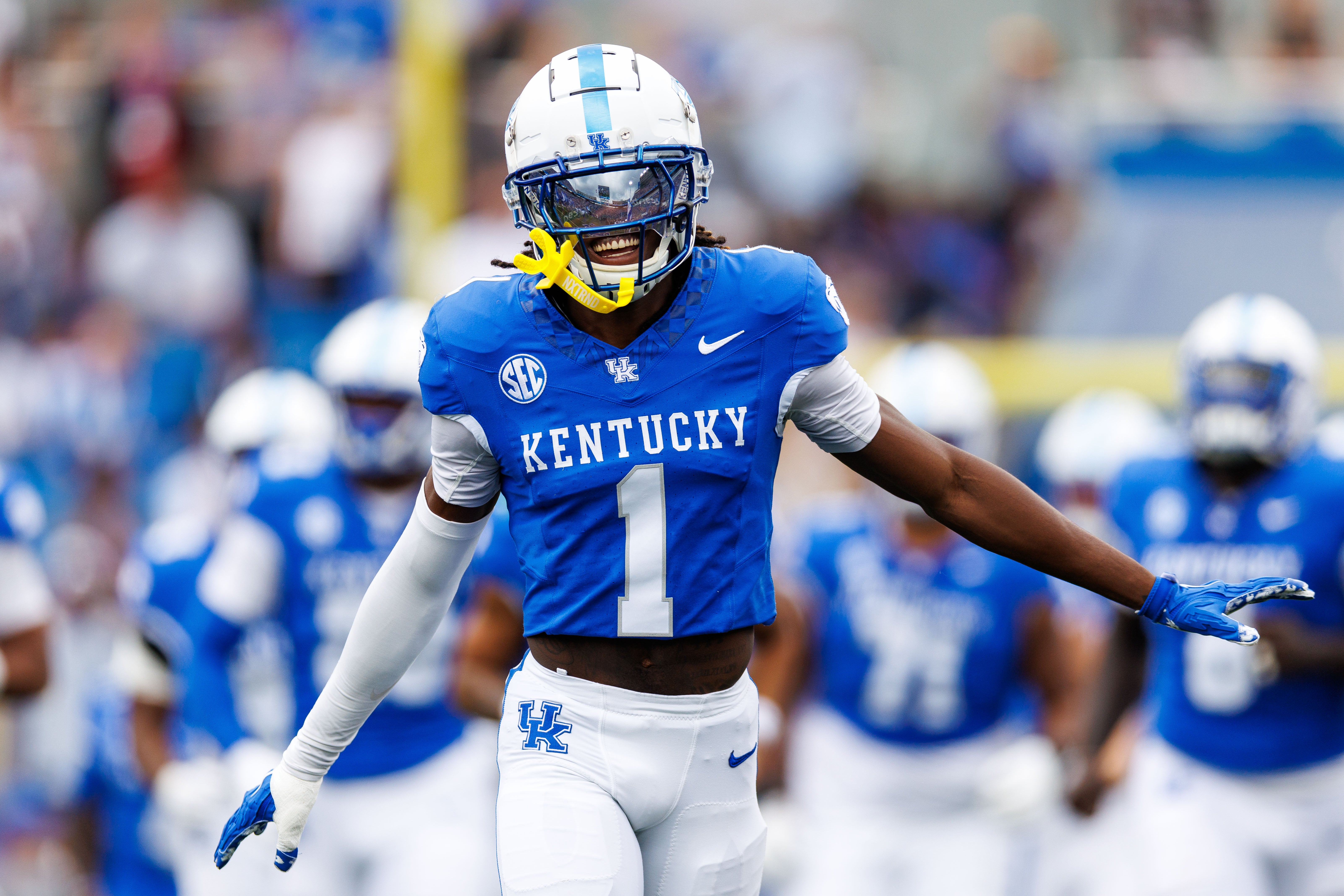 Kentucky Wildcats defensive back Maxwell Hairston (1) runs onto the field before the game against the Ohio Bobcats at Kroger Field.