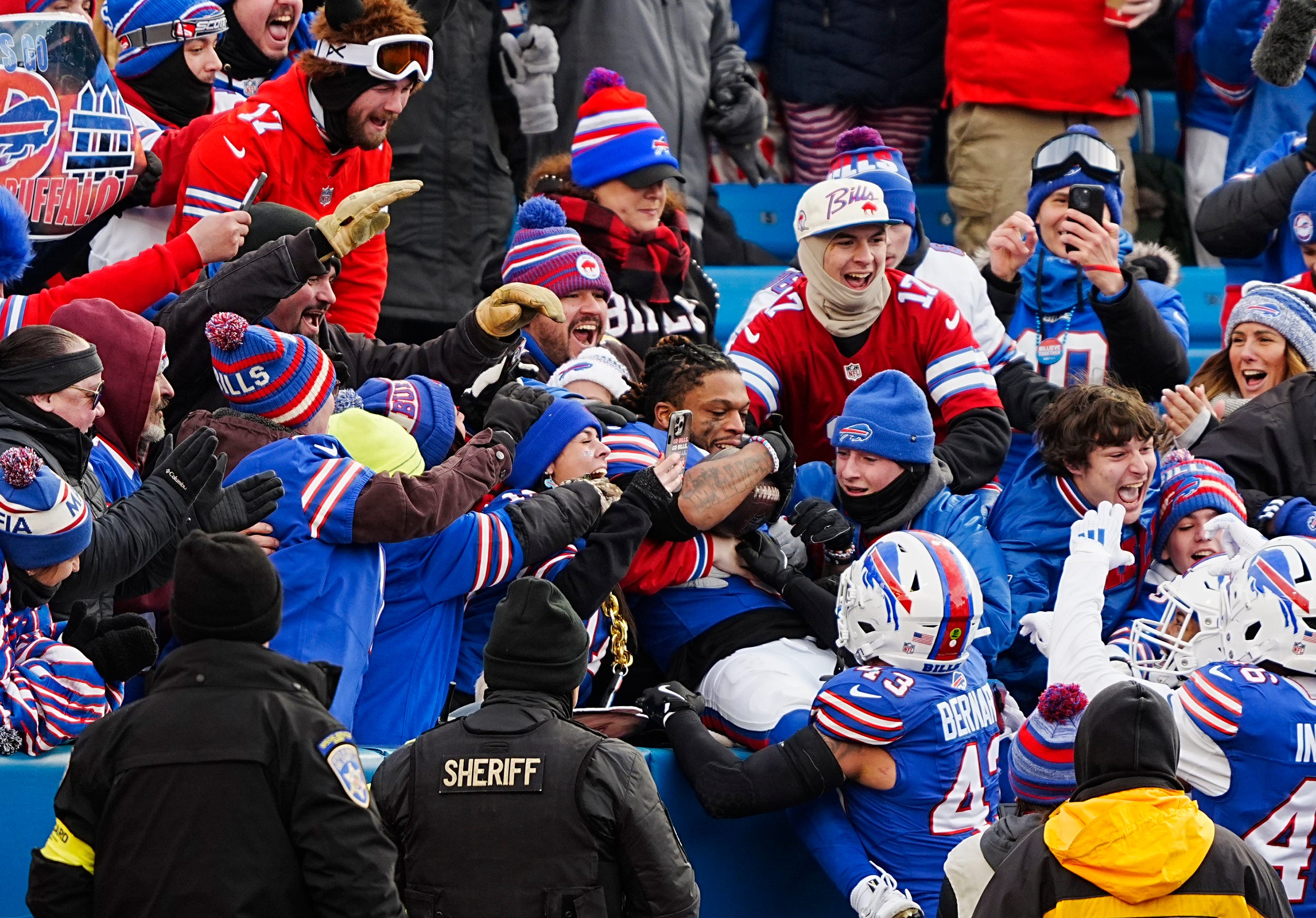 Buffalo Bills safety Damar Hamlin celebrates with the fans his interception during the second half of the Buffalo Bills wild card game against the Denver Broncos at Highmark Stadium in Orchard Park on Jan. 12, 2025.