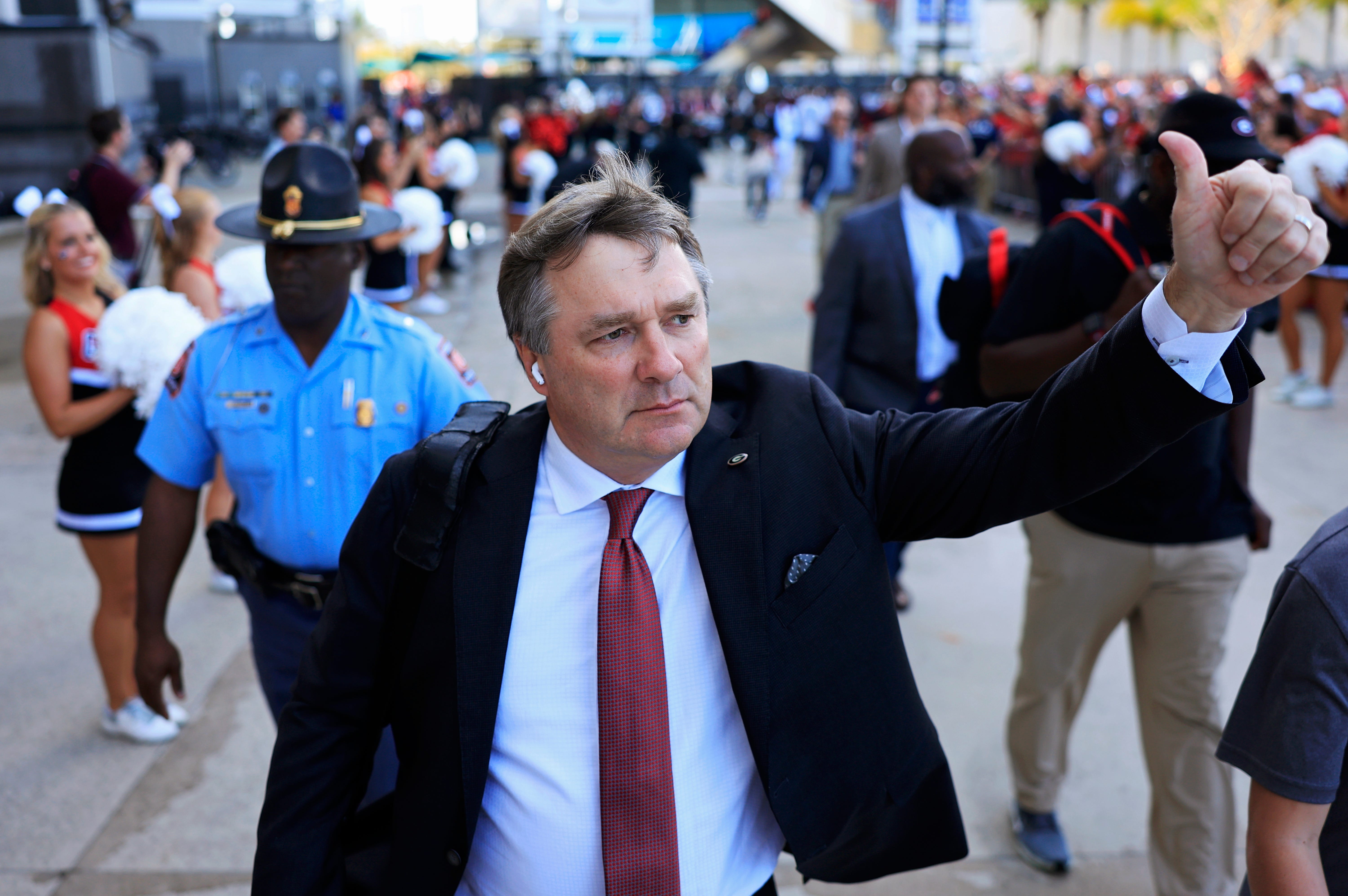 Georgia Bulldogs head coach Kirby Smart gives a thumbs up he arrives for the Dawg Walk before an NCAA college football matchup against the Florida Gators Saturday, Nov. 2, 2024 at EverBank Stadium.