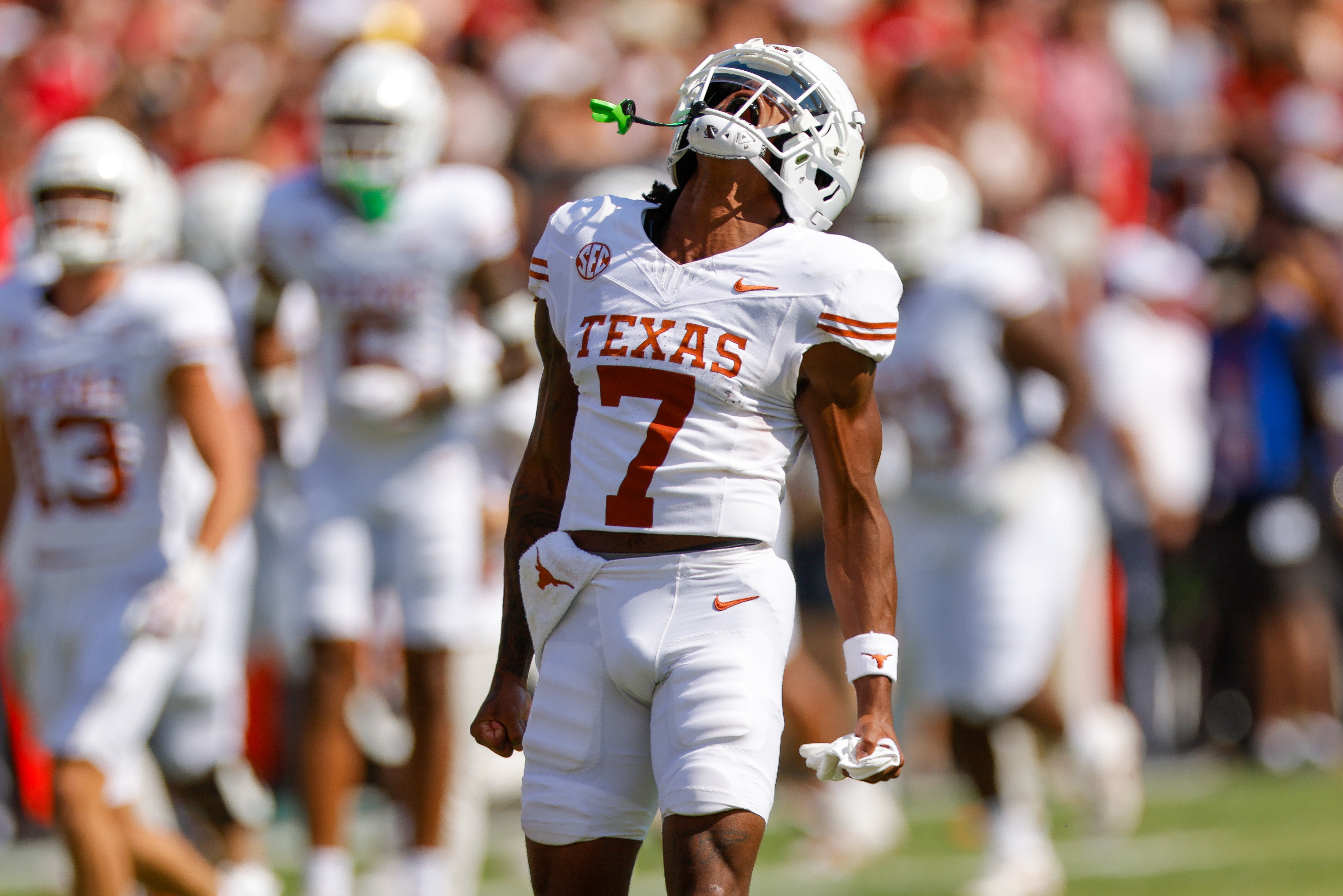 Oct 12, 2024; Dallas, Texas, USA; Texas Longhorns wide receiver Isaiah Bond (7) runs on to the field prior to the game against the Oklahoma Sooners at the Cotton Bowl.