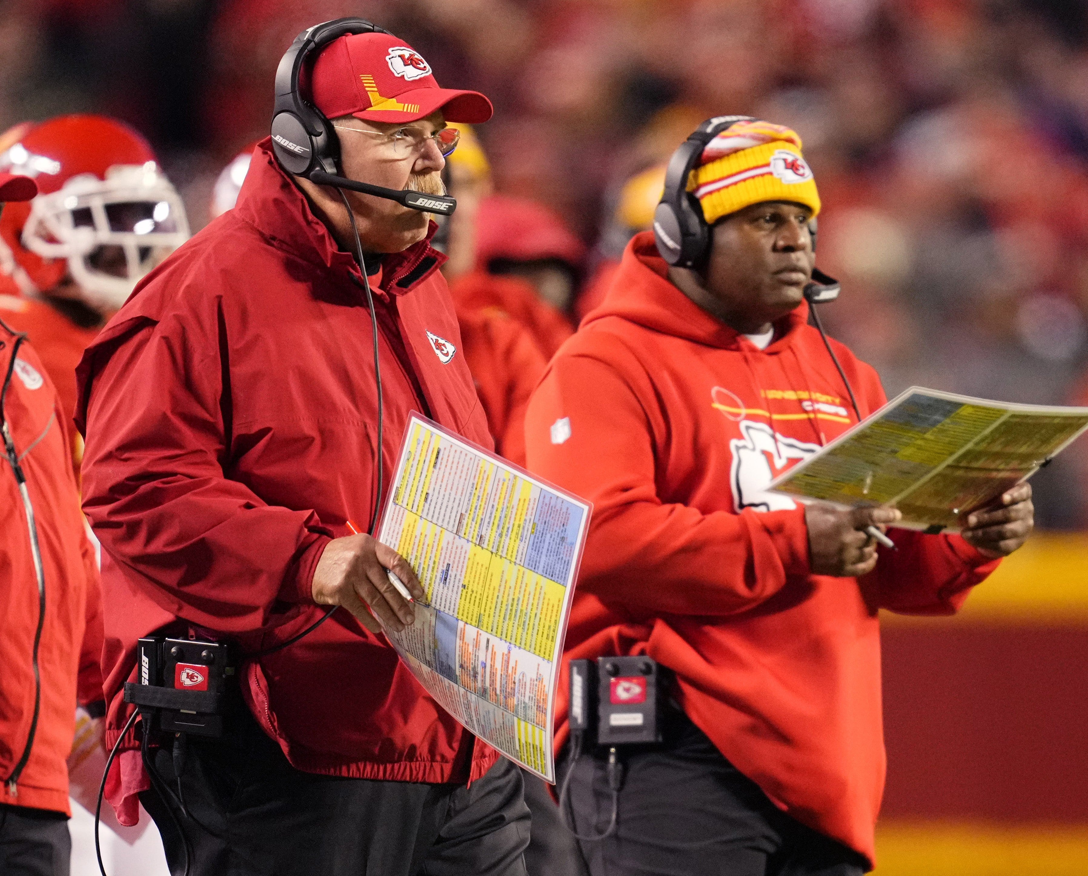 Nov 1, 2021; Kansas City, Missouri, USA; Kansas City Chiefs head coach Andy Reid (left) and offensive coordinator Eric Bieniemy (right) look on from the sideline during the first quarter against the New York Giants at GEHA Field at Arrowhead Stadium.