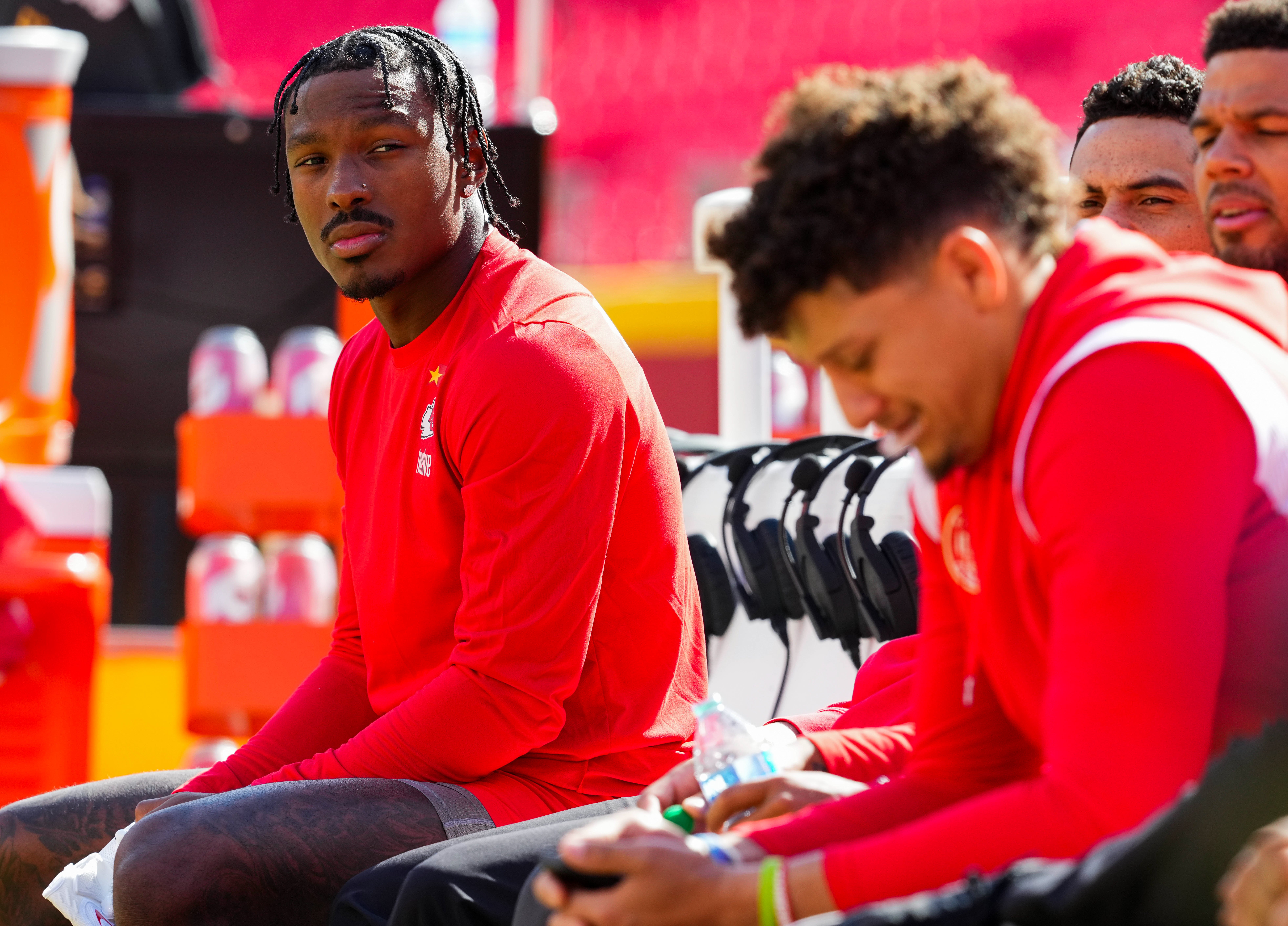 Kansas City Chiefs wide receiver Mecole Hardman Jr. (12) and quarterback Patrick Mahomes (15) prior to a game against the Los Angeles Chargers at GEHA Field at Arrowhead Stadium.