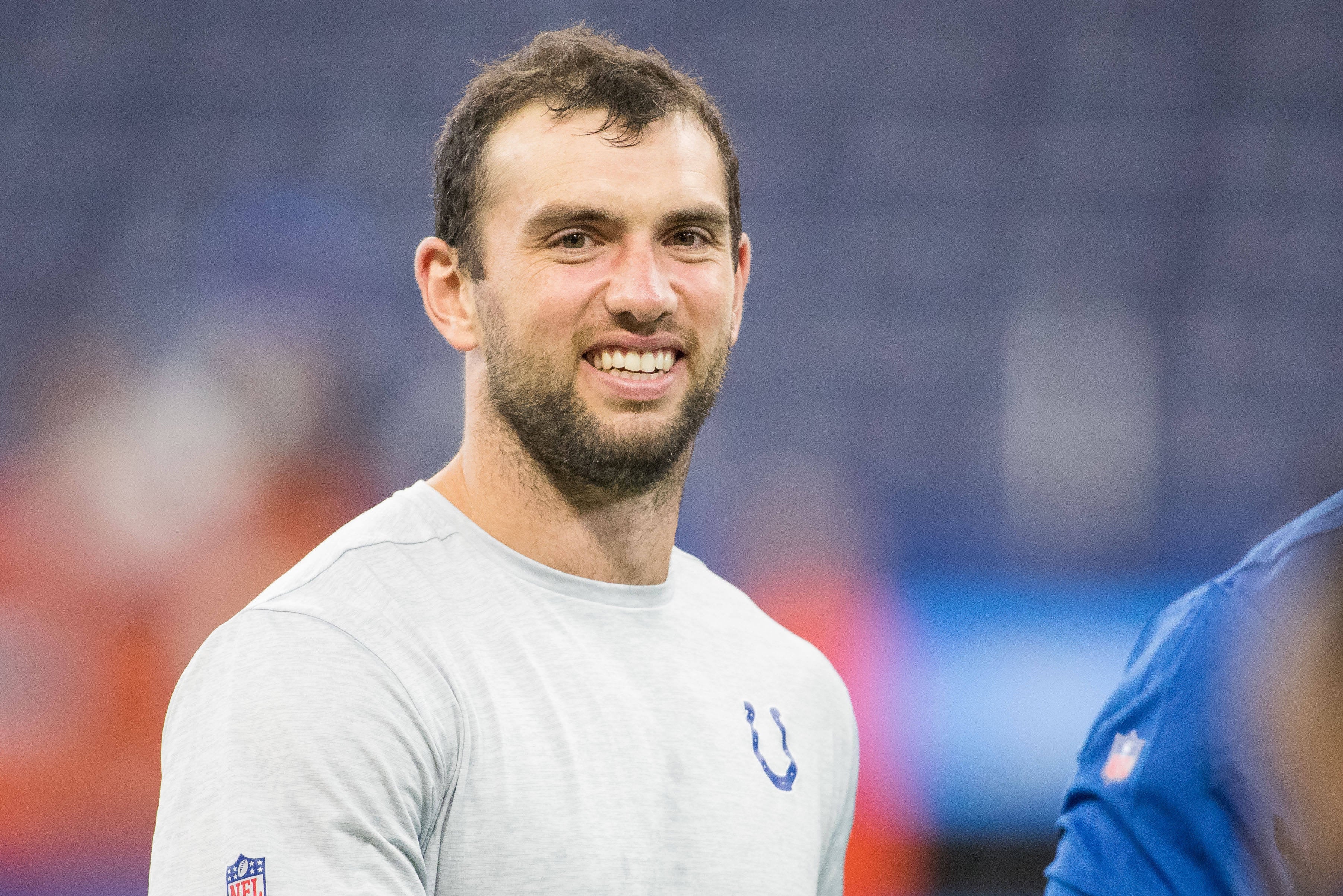 Aug 17, 2019; Indianapolis, IN, USA; Indianapolis Colts quarterback Andrew Luck (12) walks the field before the game against the Cleveland Browns at Lucas Oil Stadium.