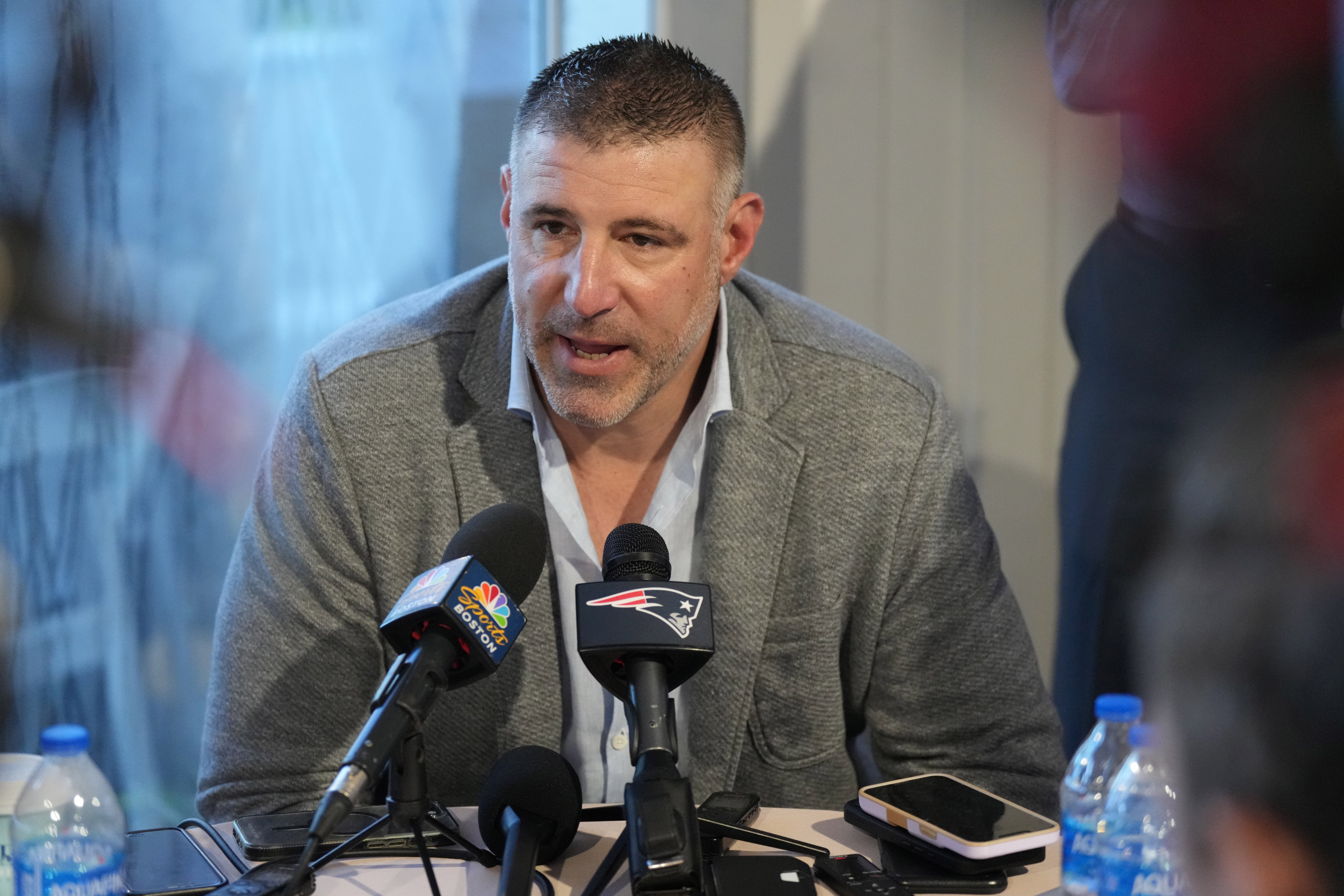 Mar 31, 2025; Palm Beach, FL, USA; New England Patriots head coach Mike Vrabel answers questions from the media during the NFL Annual League Meeting at The Breakers.