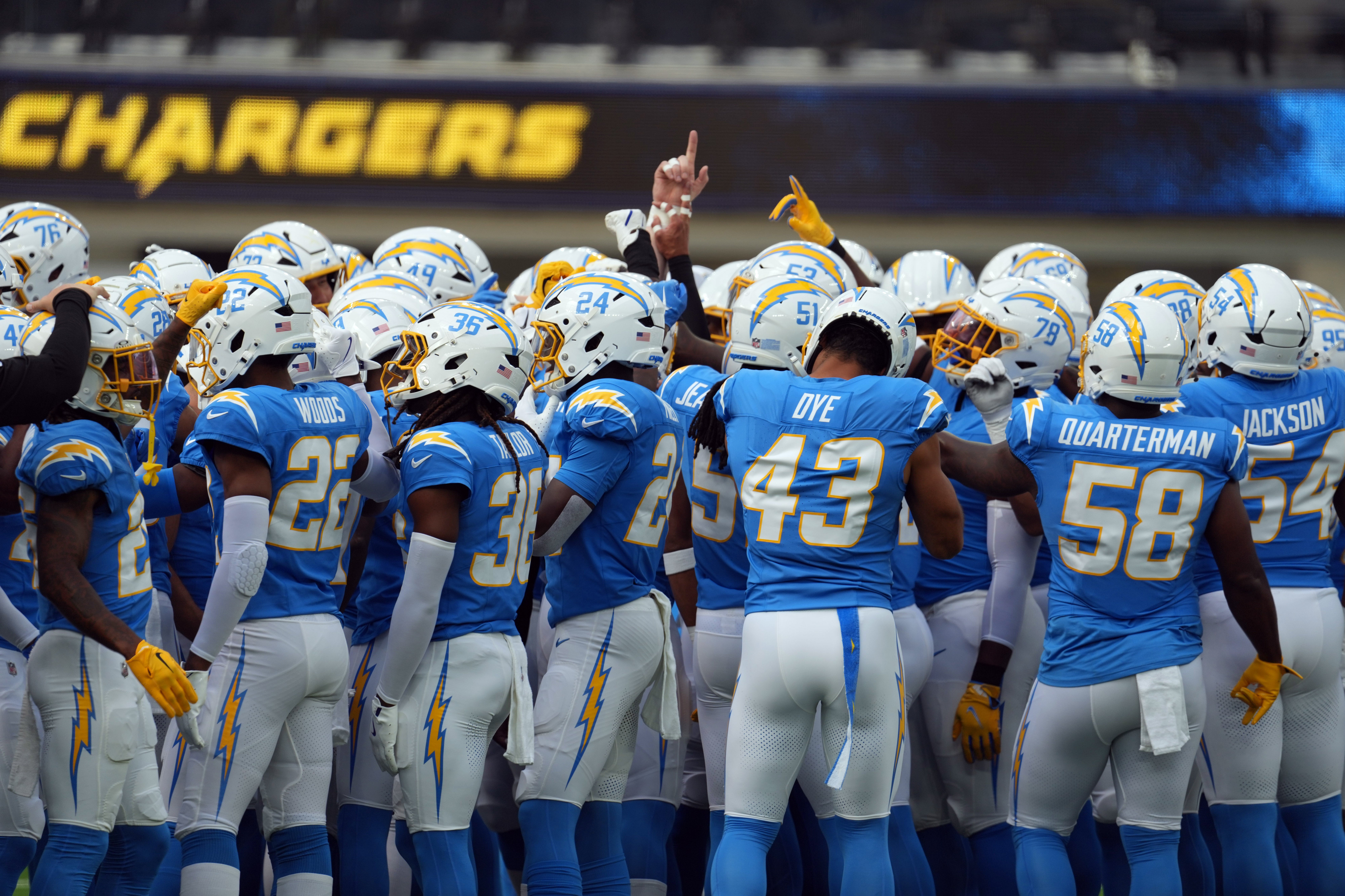 Los Angeles Chargers players huddle