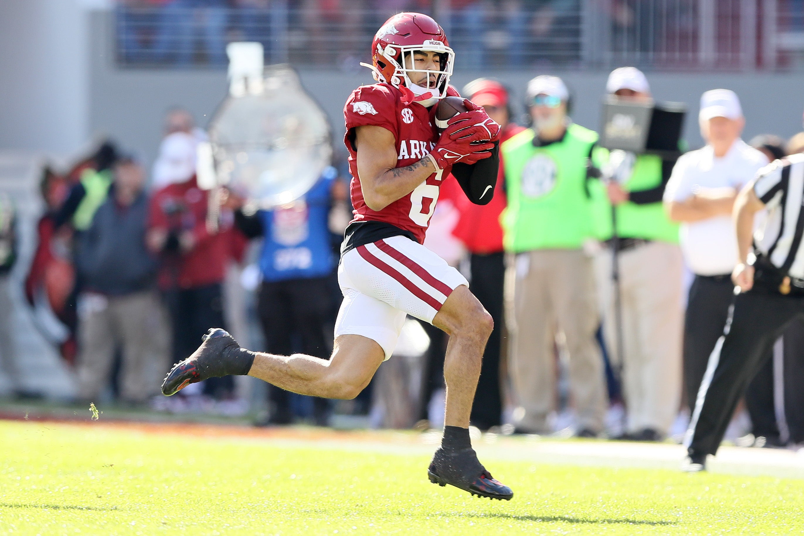 Nov 16, 2024; Fayetteville, Arkansas, USA; Arkansas Razorbacks wide receiver Isaiah Sategna (6) catches a pass during the first quarter against the Texas Longhorns at Donald W. Reynolds Razorback Stadium.