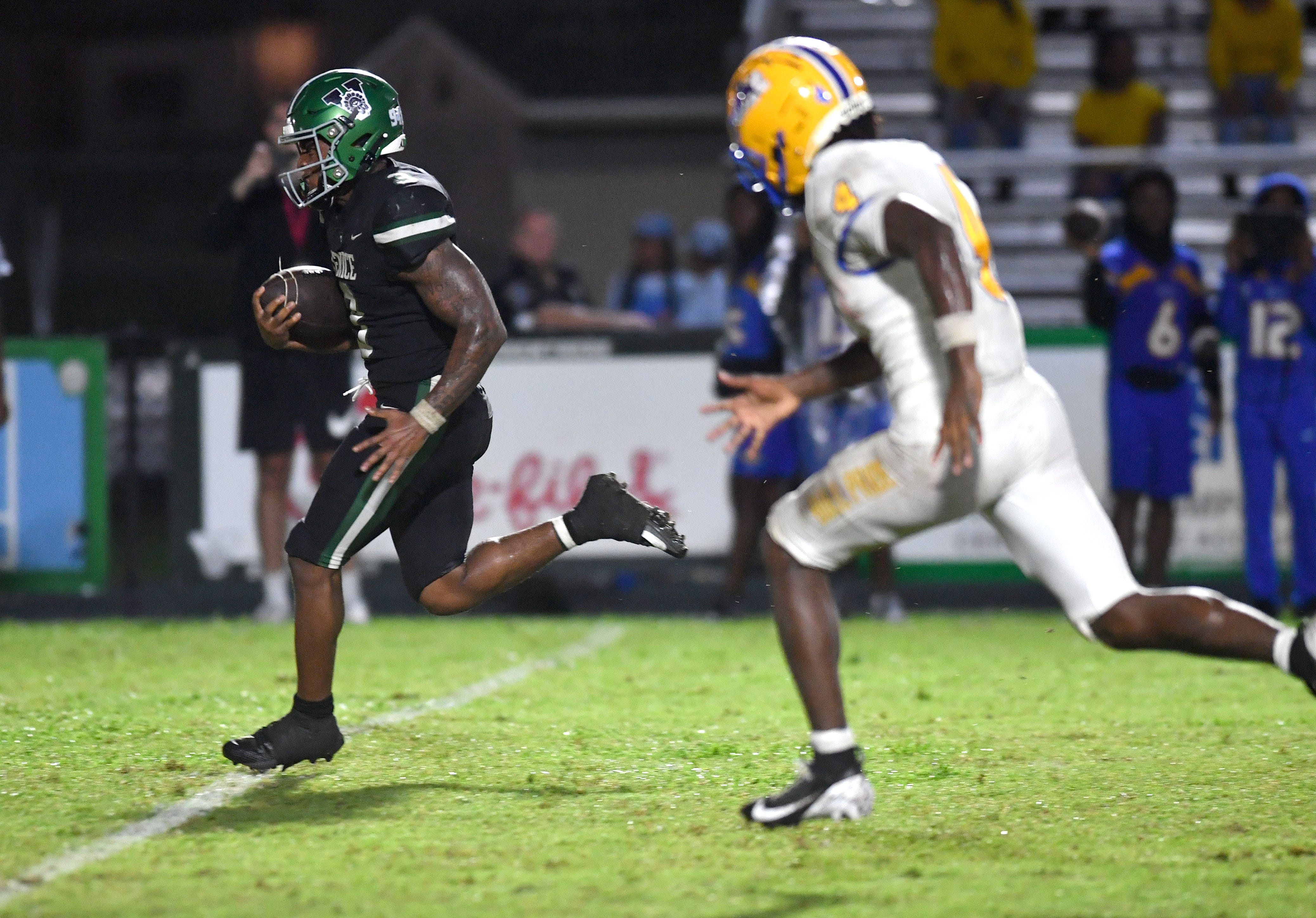 Miami Northwestern defensive back J'Vari Flowers (#4) is unable to catch Venice High running back Jamarice Wilder (#3) on his way to the end zone untouched. The Venice High Indians hosted the Miami Northwestern Bulls in a non-conference game Friday evening, Aug. 30, 2024.