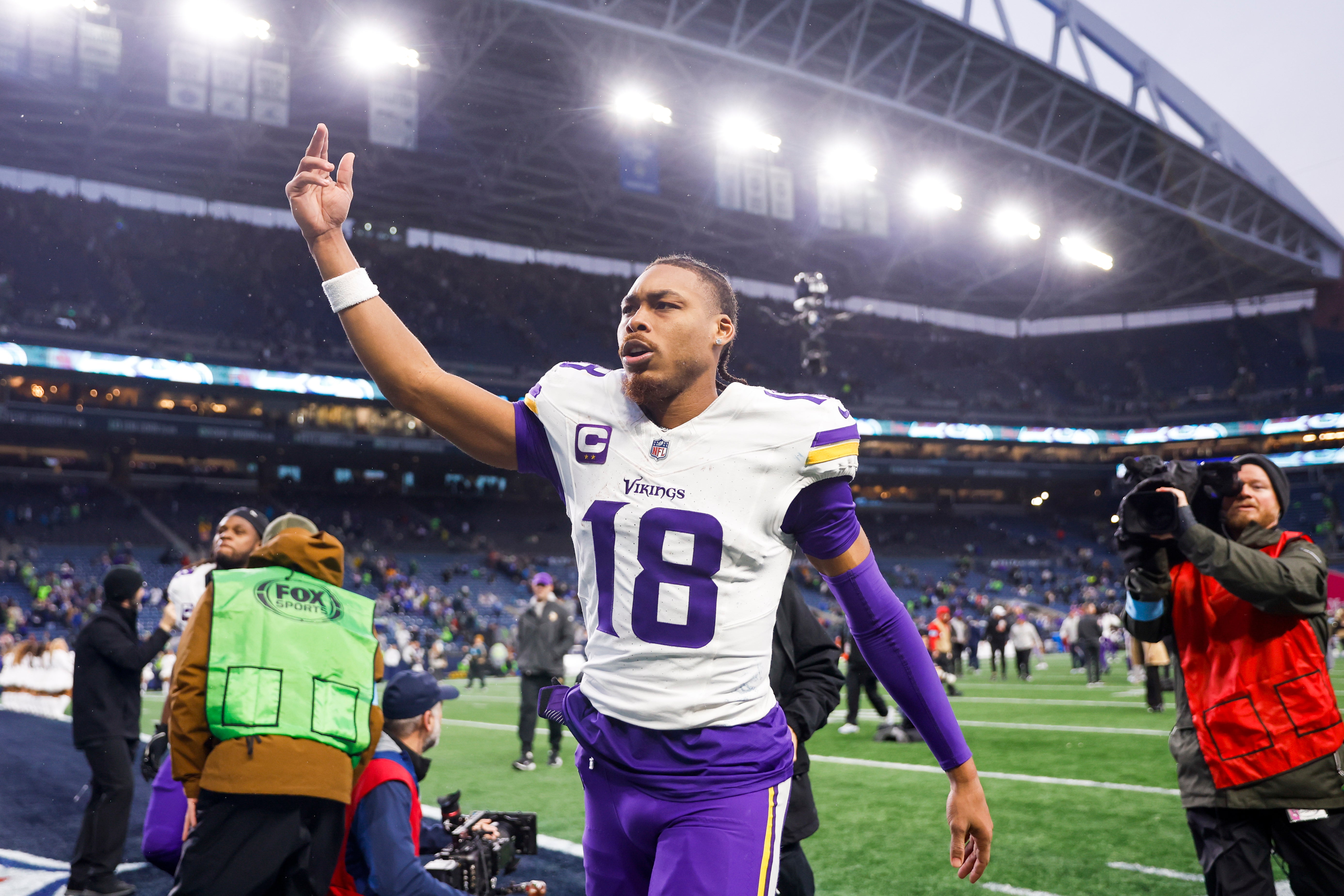 Dec 22, 2024; Seattle, Washington, USA; Minnesota Vikings wide receiver Justin Jefferson (18) celebrates following a victory against the Seattle Seahawks at Lumen Field.