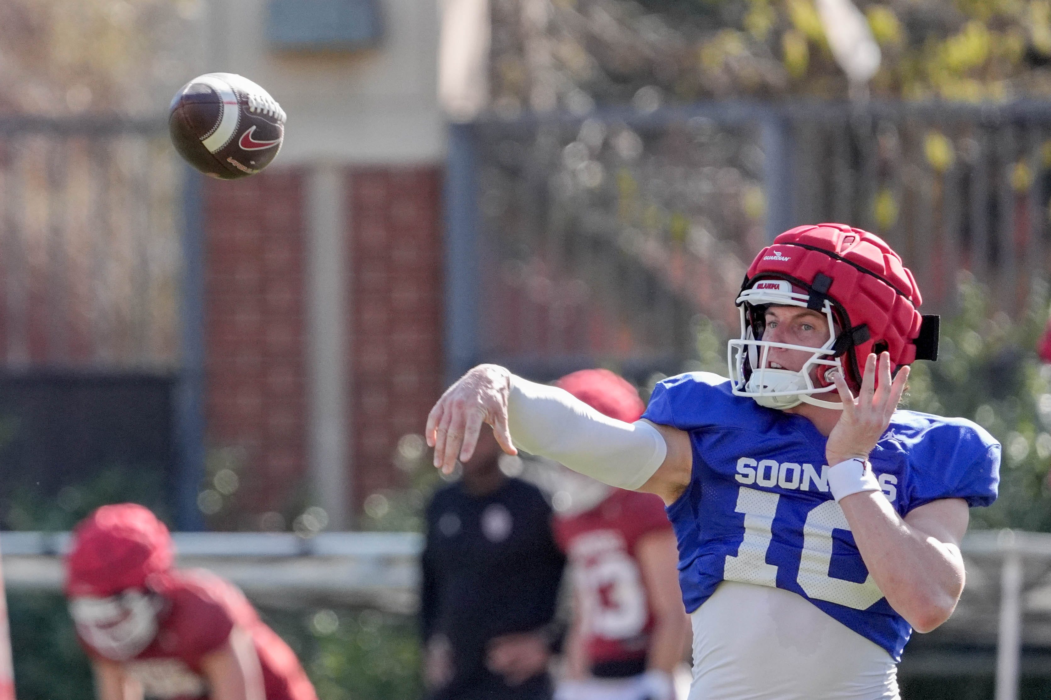 John Mateer (10) runs drills during an Oklahoma (OU) football practice at the Gaylord Family Oklahoma Memorial Stadium in Norman, Okla., on Tuesday, March 25, 2025.