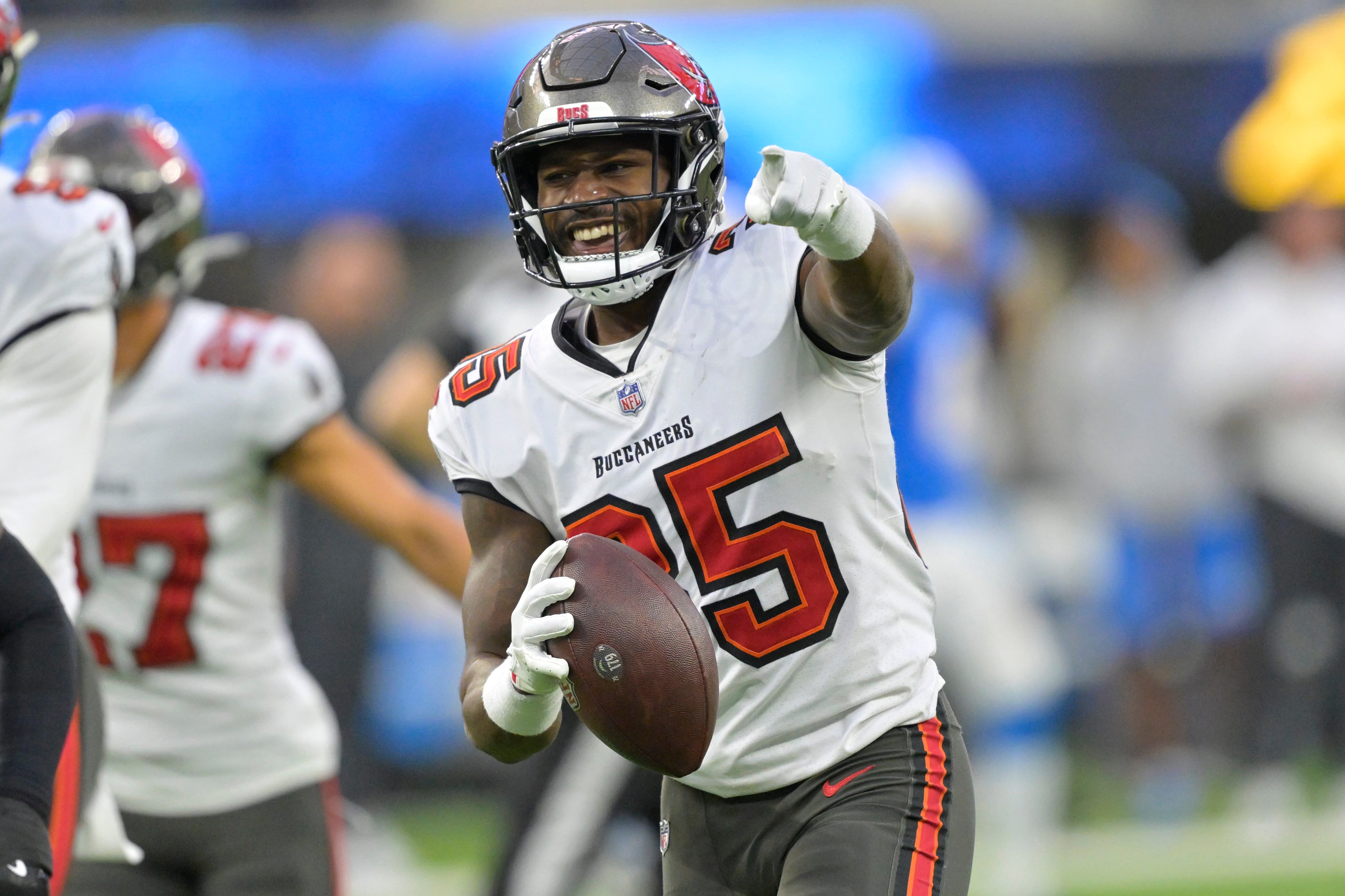 Dec 15, 2024; Inglewood, California, USA; Tampa Bay Buccaneers cornerback Jamel Dean (35) celebrates after a fumble recovery in the second half against the Los Angeles Chargers at SoFi Stadium.