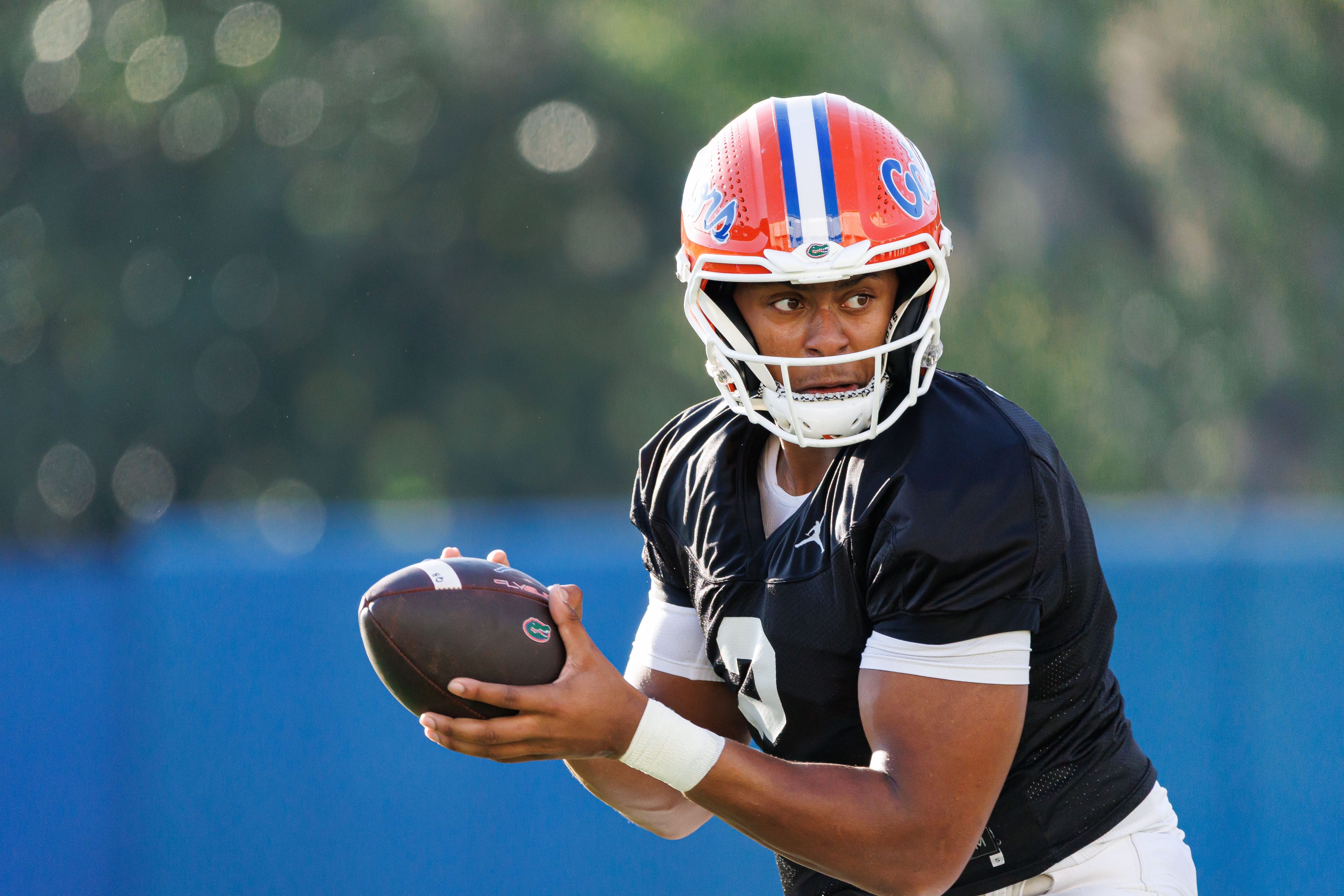 Florida Gators quarterback DJ Lagway (2) looks to hand off the ball during spring football practice at Heavener Football Complex at the University of Florida in Gainesville, FL on Thursday, March 6, 2025.