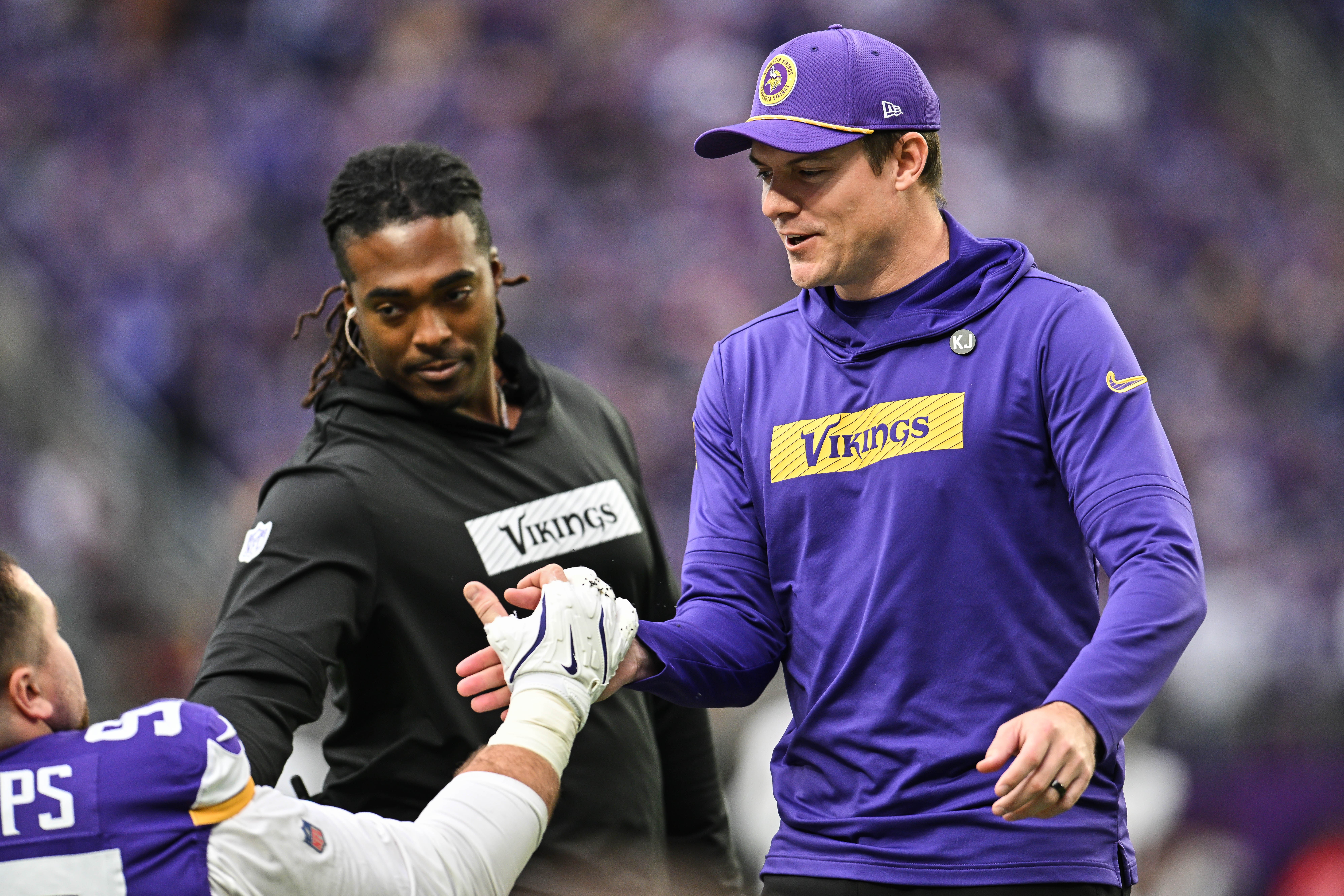 Dec 8, 2024; Minneapolis, Minnesota, USA; Minnesota Vikings head coach Kevin O'Connell greets his players before the game against the Atlanta Falcons at U.S. Bank Stadium.