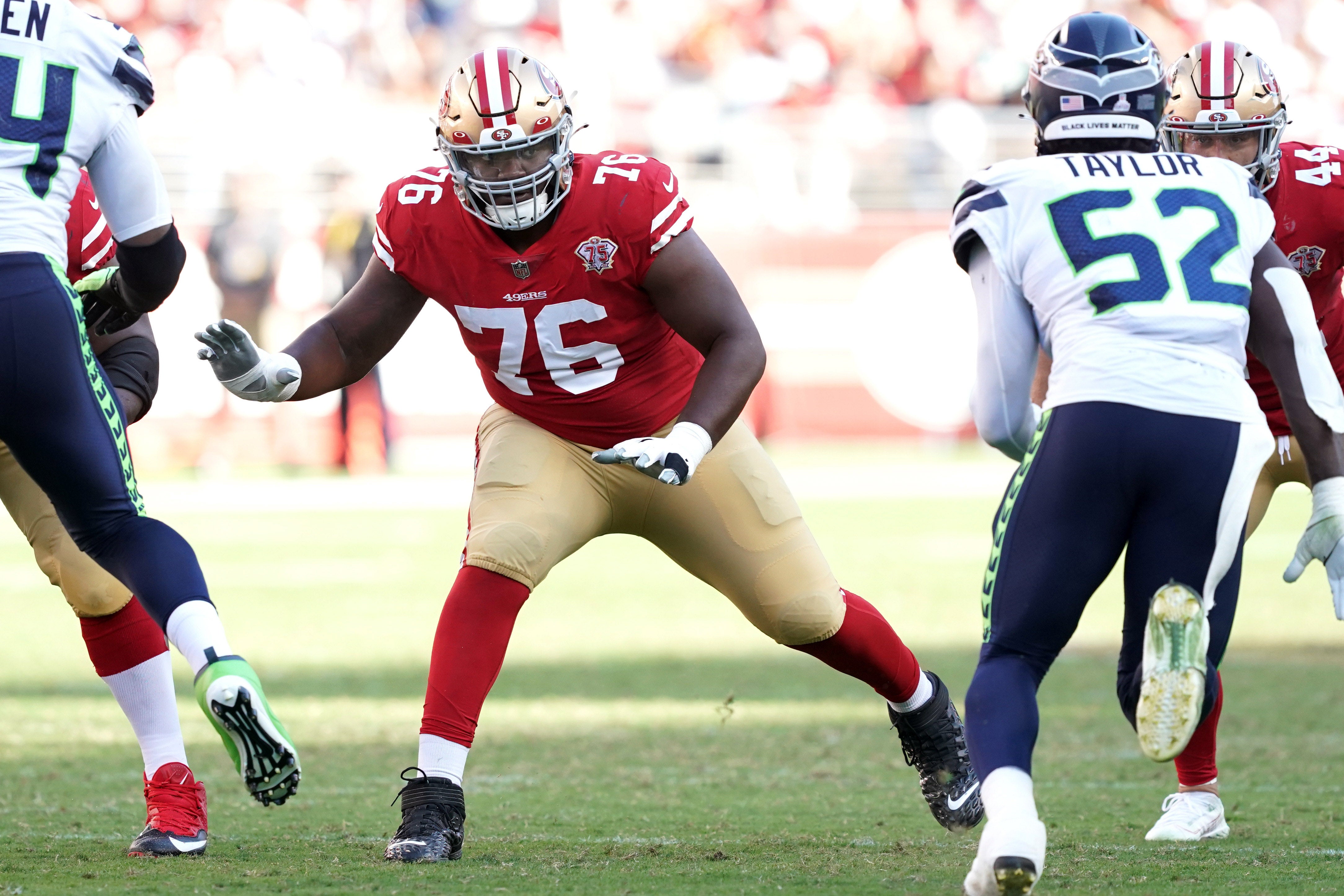 Oct 3, 2021; Santa Clara, California, USA; San Francisco 49ers offensive tackle Jaylon Moore (76) blocks during the fourth quarter against the Seattle Seahawks at Levi's Stadium.