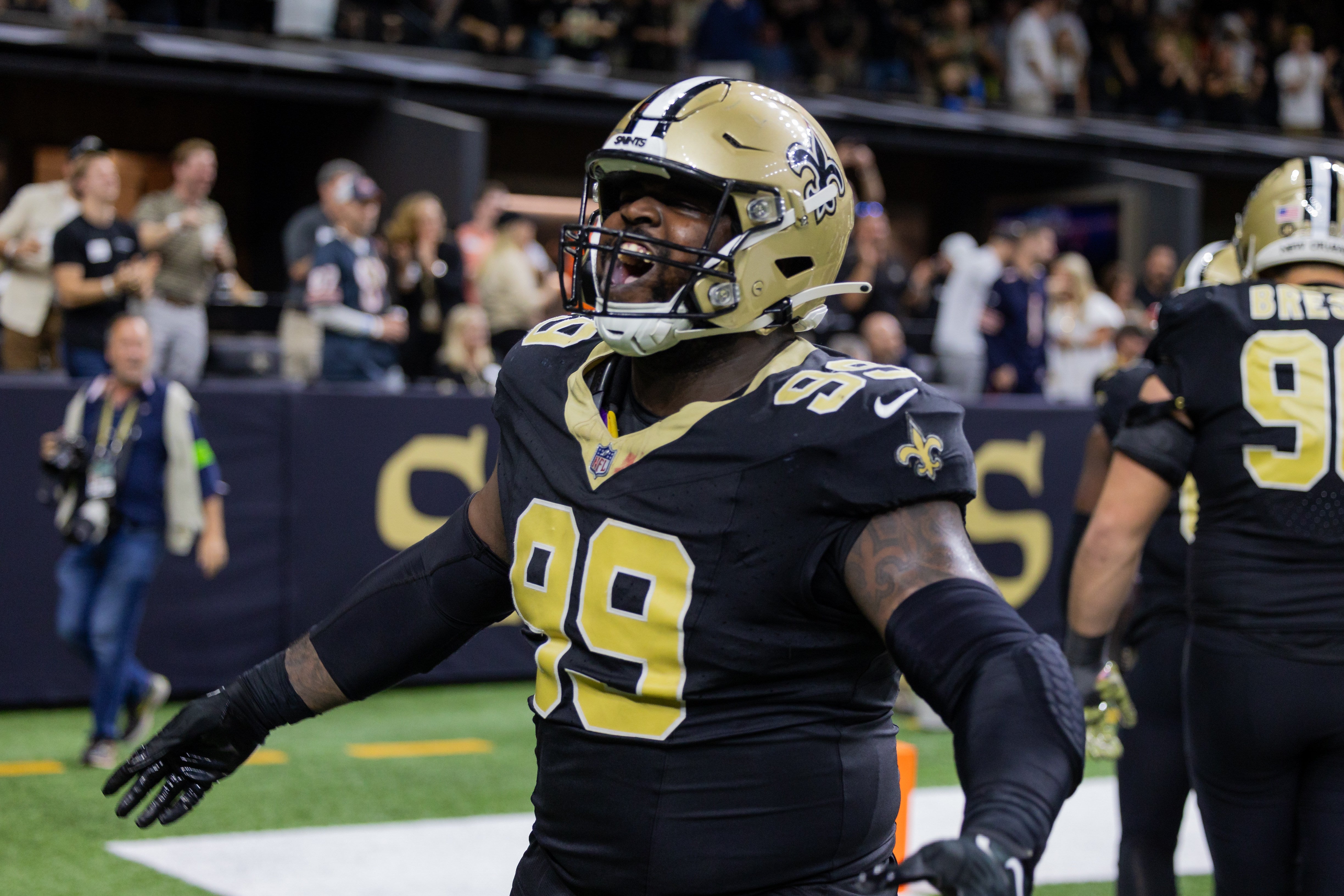 Nov 5, 2023; New Orleans, Louisiana, USA; New Orleans Saints defensive tackle Khalen Saunders (99) shows emotion after an interception against the Chicago Bears during the second half at the Caesars Superdome