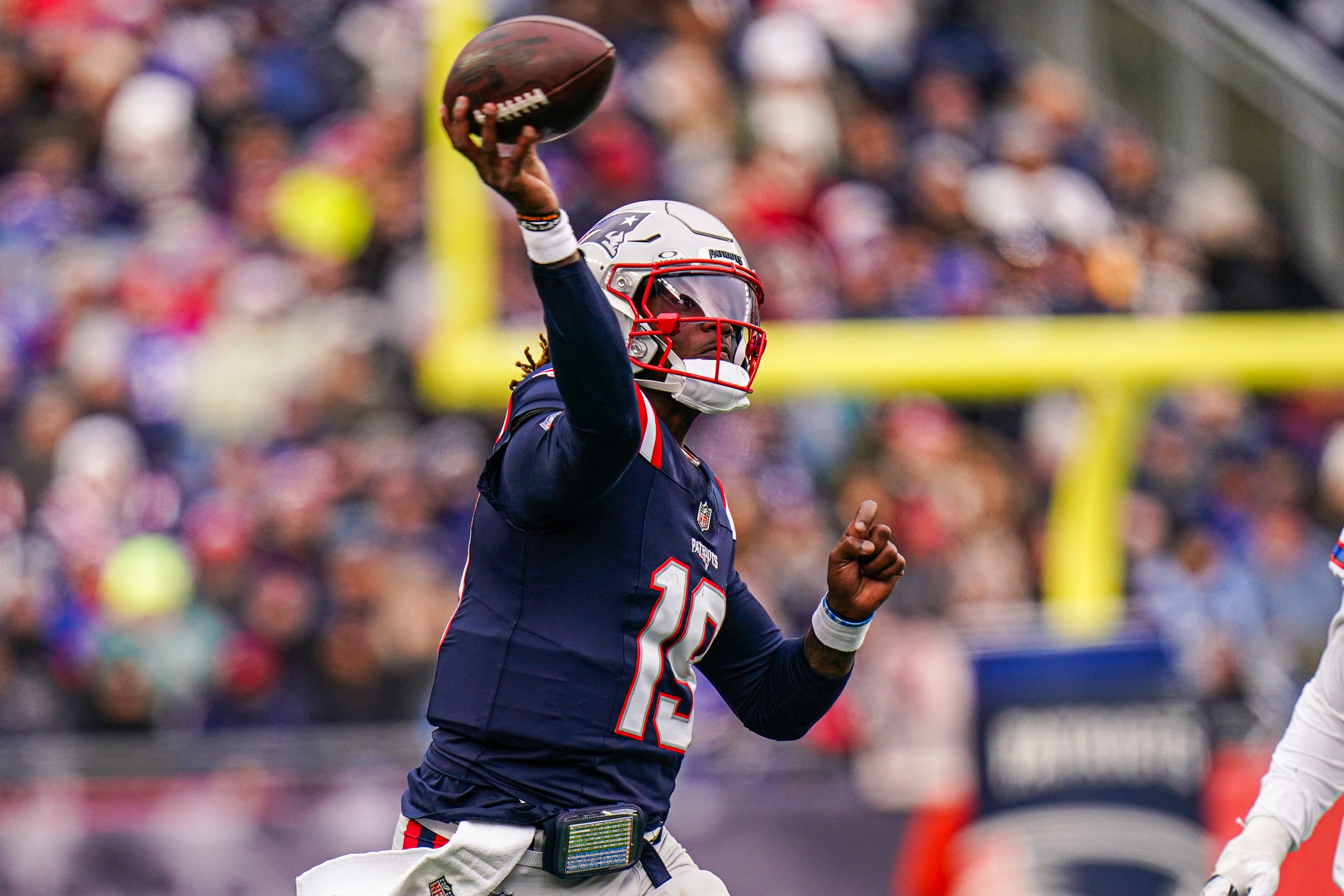 Jan 5, 2025; Foxborough, Massachusetts, USA; New England Patriots quarterback Joe Milton III (19) throws a pass against the Buffalo Bills in the first half at Gillette Stadium.