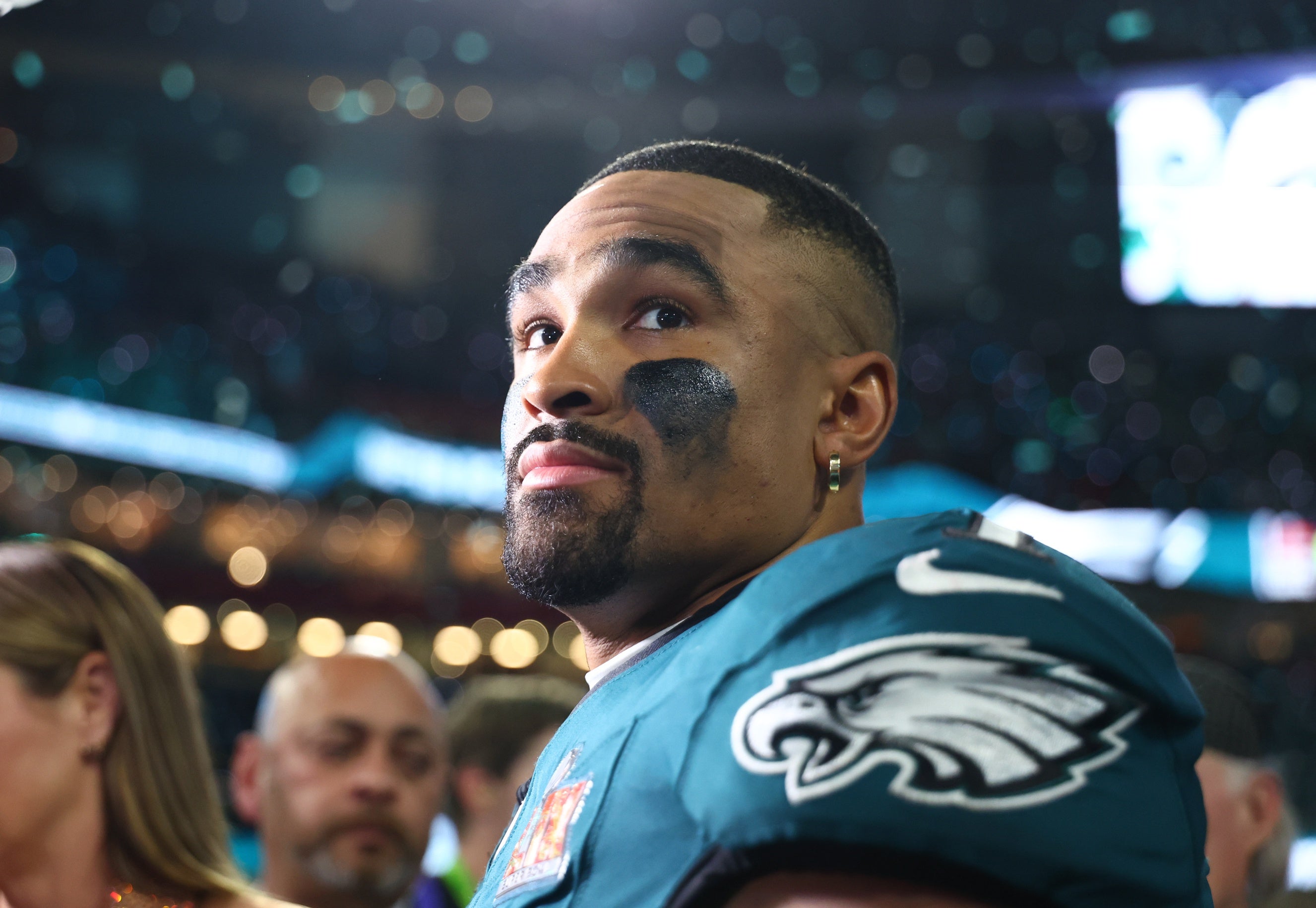 Philadelphia Eagles quarterback Jalen Hurts (1) reacts on the field after defeating the Kansas City Chiefs in Super Bowl LIX at Ceasars Superdome.