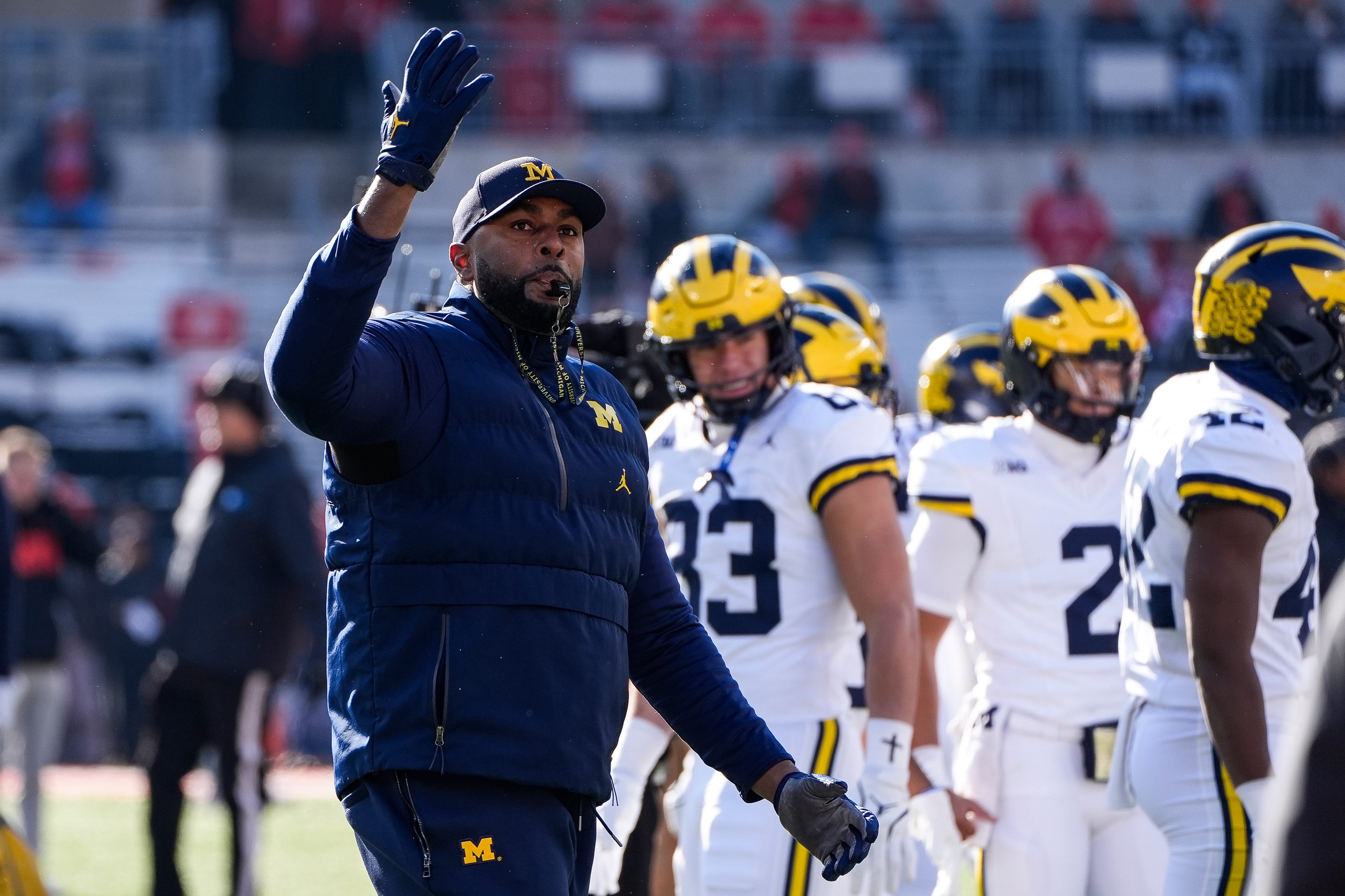 Sherrone Moore getting his players ready at Michigan