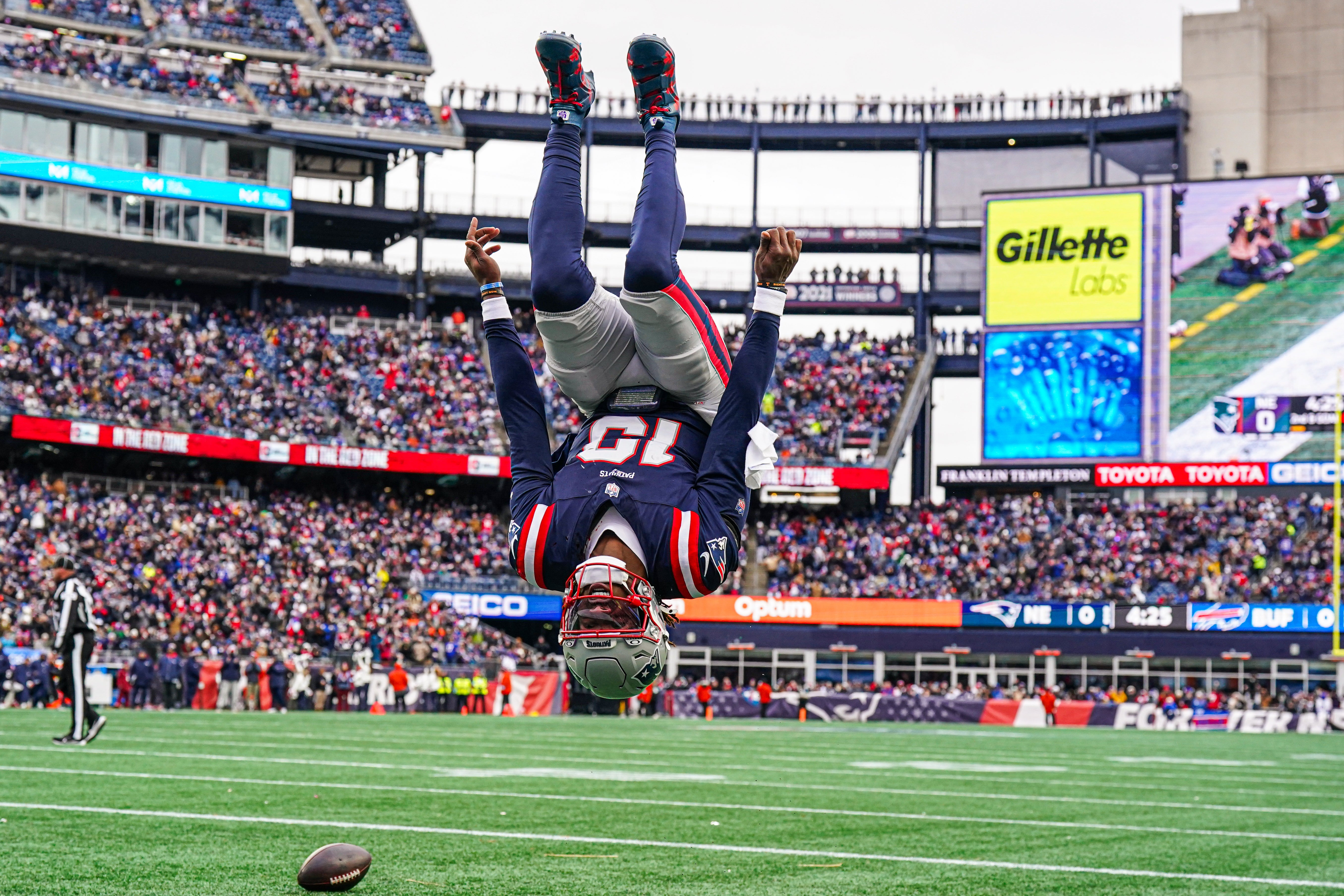 New England Patriots quarterback Joe Milton III (19) reacts after runs the ball for a touchdown against the Buffalo Bills in the first quarter at Gillette Stadium.