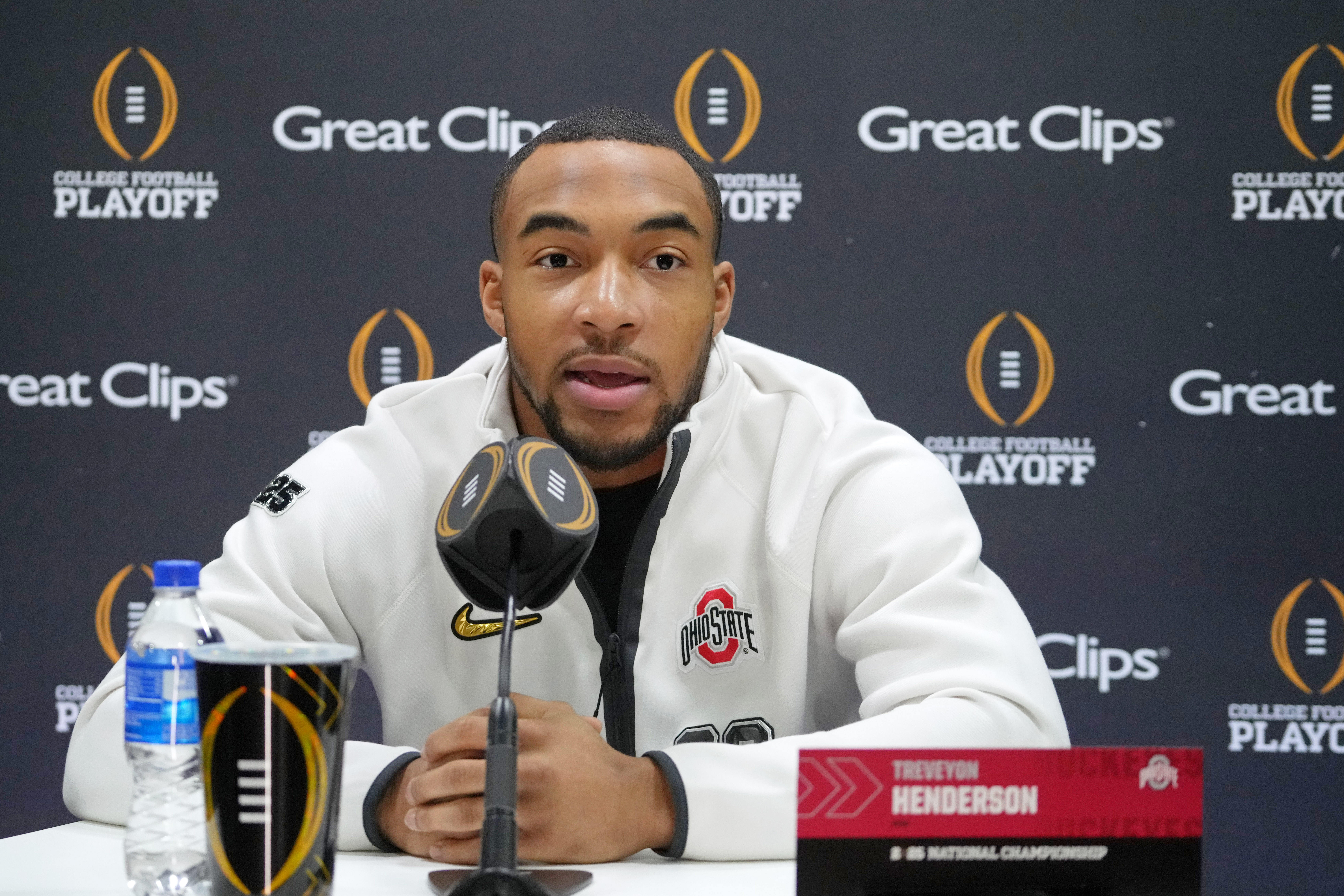 Jan 18, 2025; Atlanta, GA, USA; Ohio State Buckeyes running back TreVeyon Henderson (32) talks to the media during 2025 CFP National Championship Media Day at Georgia World Congress Center, Building A.