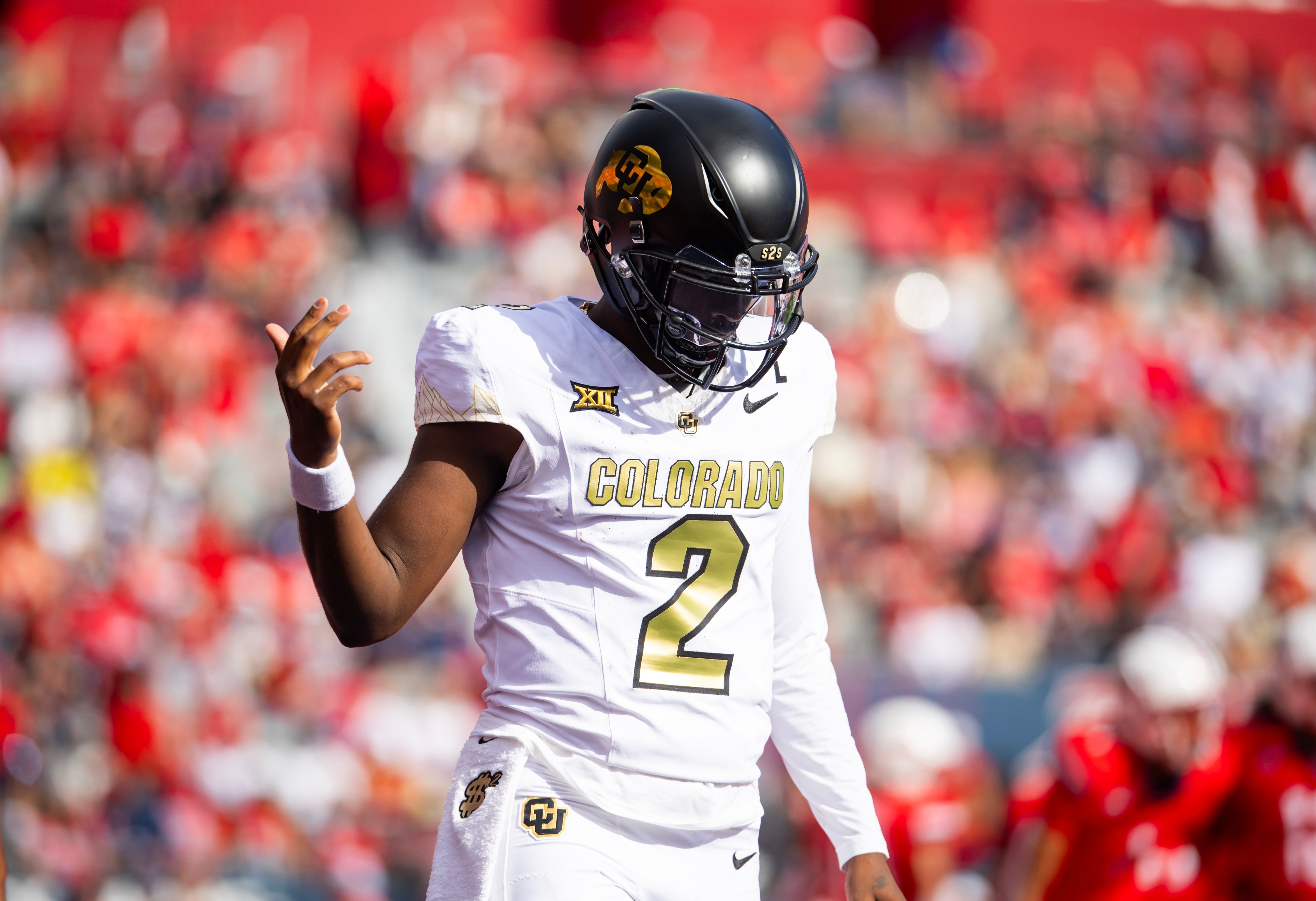 Oct 19, 2024; Tucson, Arizona, USA; Colorado Buffalos quarterback Shedeur Sanders (2) reacts against the Arizona Wildcats at Arizona Stadium.