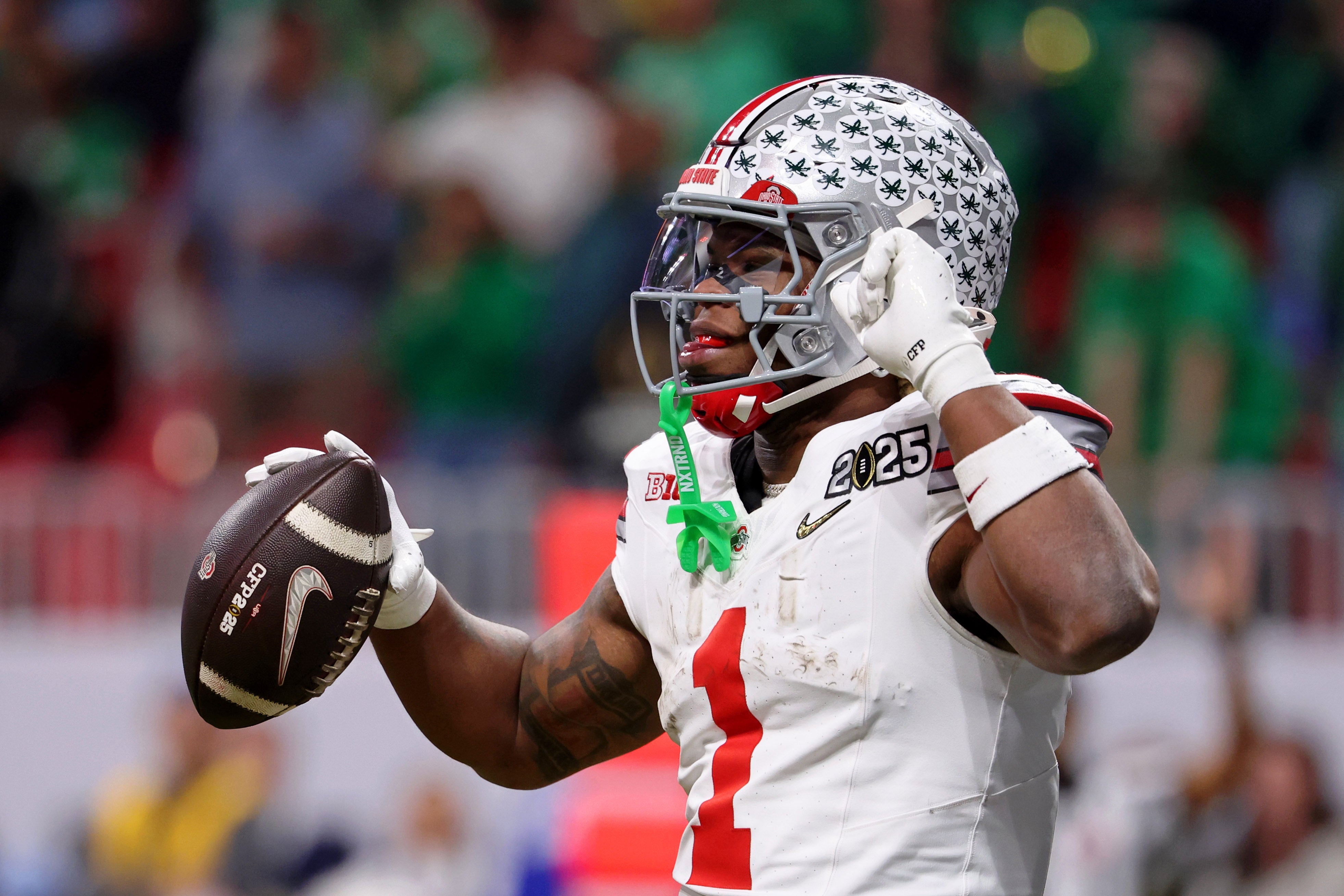 Jan 20, 2025; Atlanta, GA, USA; Ohio State Buckeyes running back Quinshon Judkins (1) reacts after scoring a touchdown against the Notre Dame Fighting Irish during the first half the CFP National Championship college football game at Mercedes-Benz Stadium.