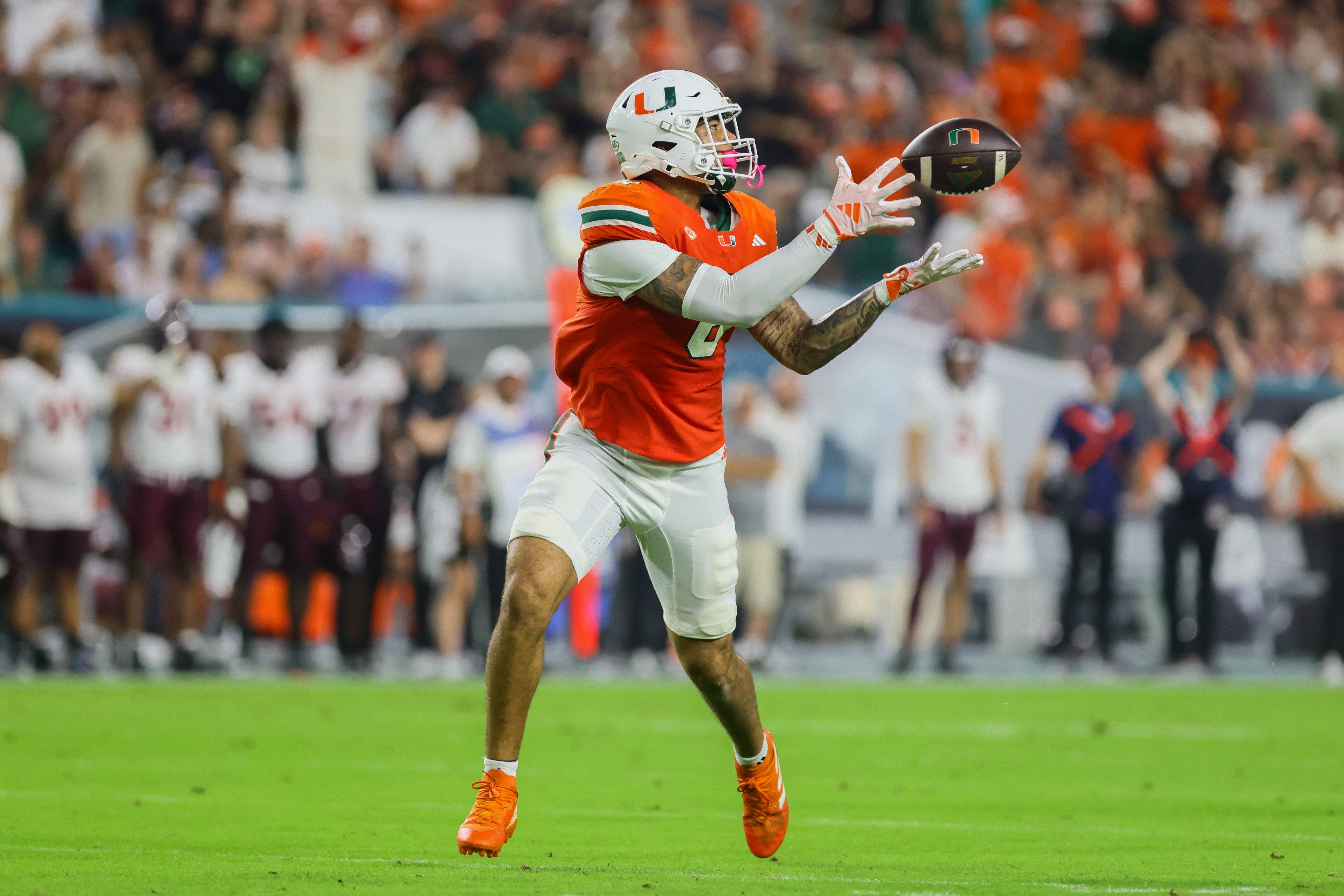 Miami Hurricanes tight end Elijah Arroyo (8) catches the football for a touchdown against the Virginia Tech Hokies