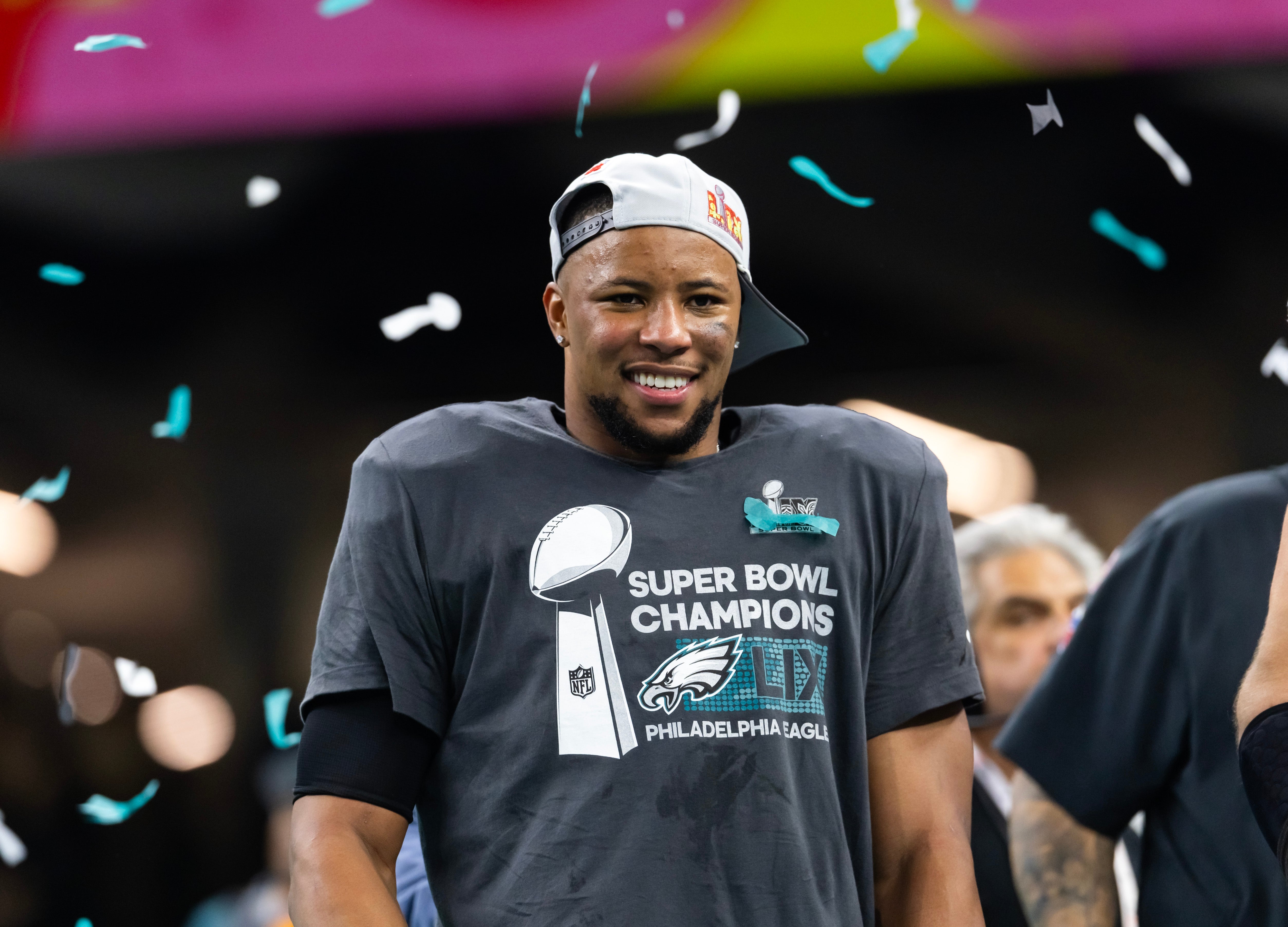 Philadelphia Eagles running back Saquon Barkley (26) celebrates after defeating the Kansas City Chiefs during Super Bowl LIX at Ceasars Superdome.