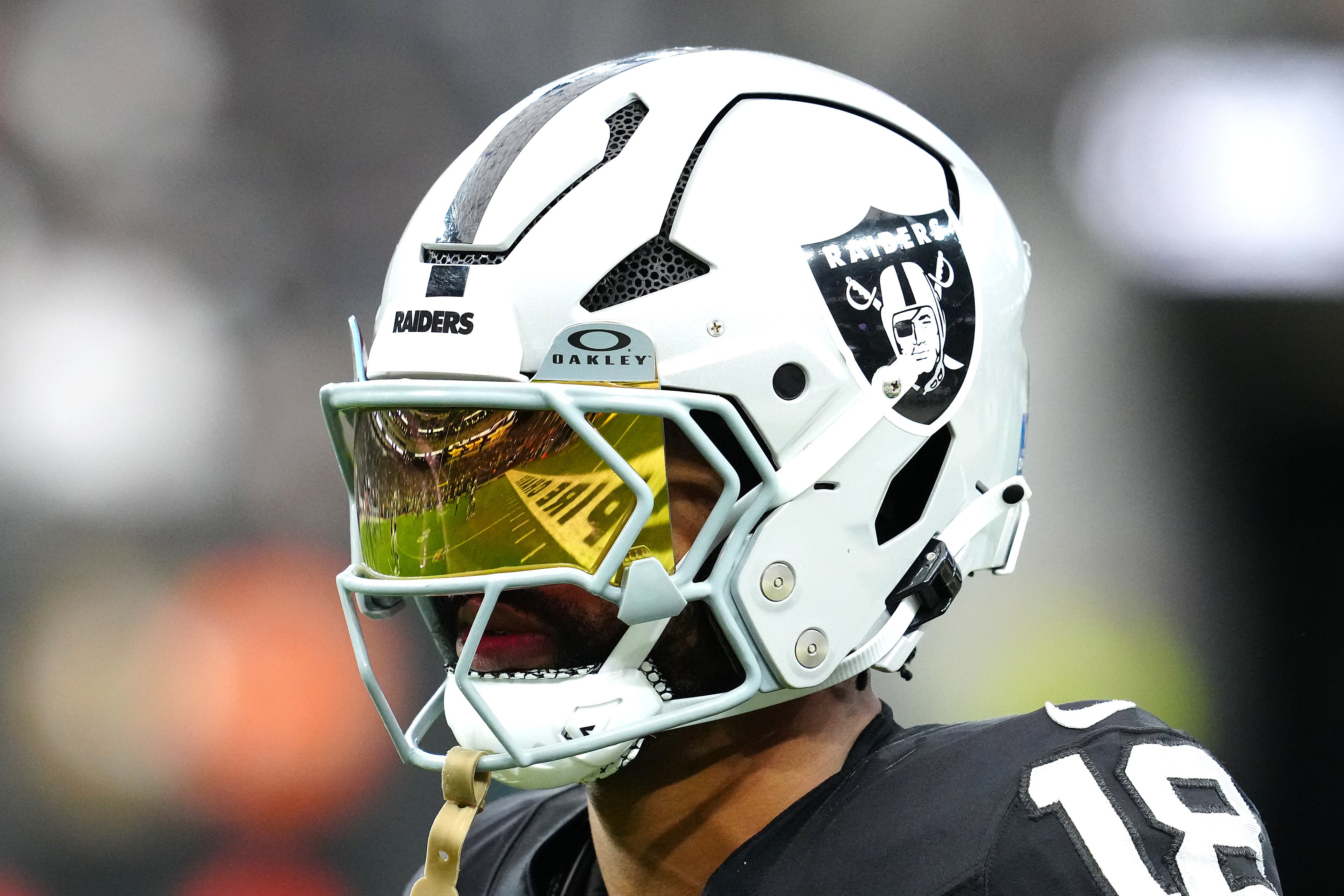 Dec 22, 2024; Paradise, Nevada, USA; Las Vegas Raiders cornerback Jack Jones (18) warms up before a game against the Jacksonville Jaguars at Allegiant Stadium.