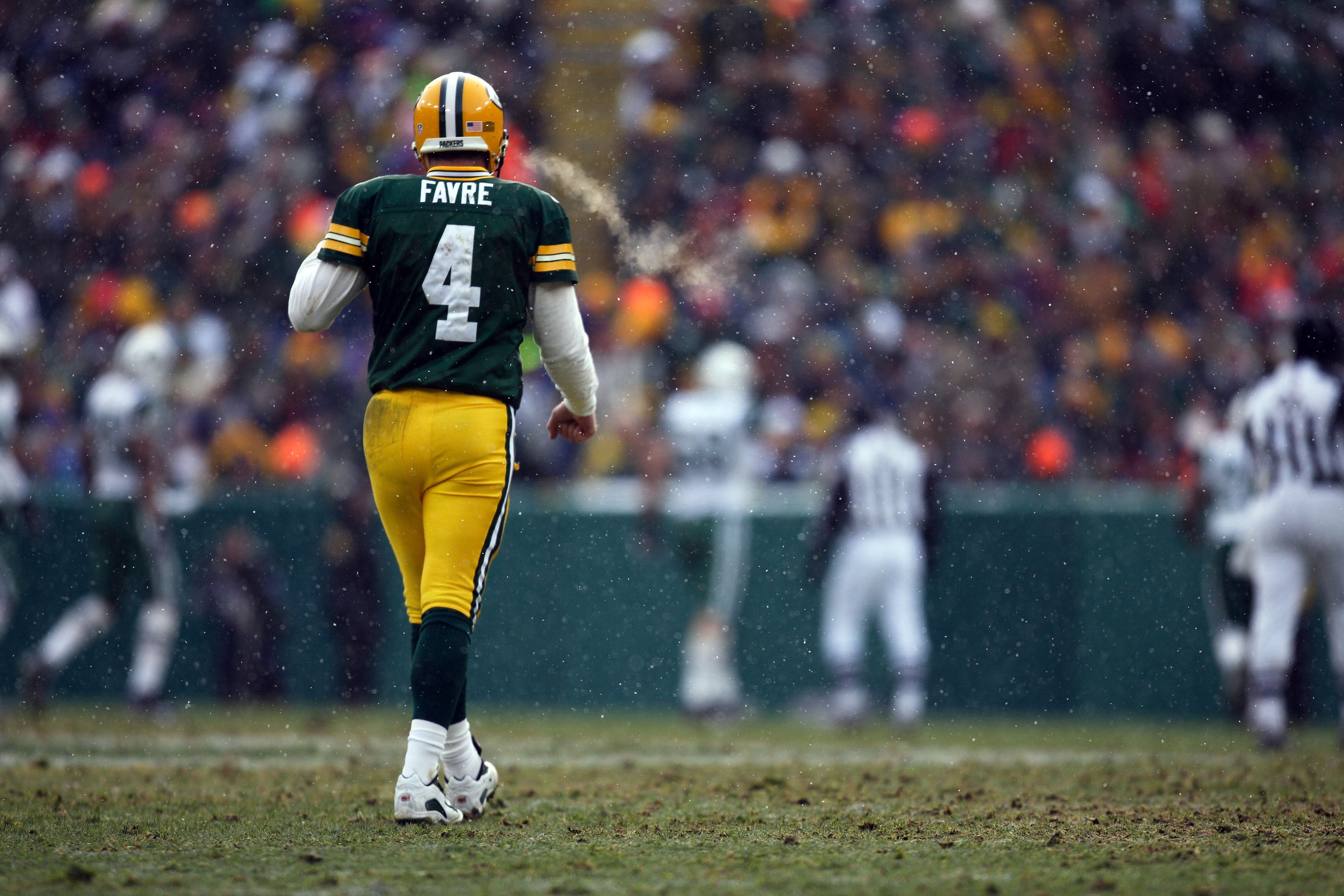 December 3, 2006; Green Bay, WI, USA; Green Bay Packers quarterback (4) Brett Favre walks off the field after throwing an interception against the New York Jets at Lambeau Field.