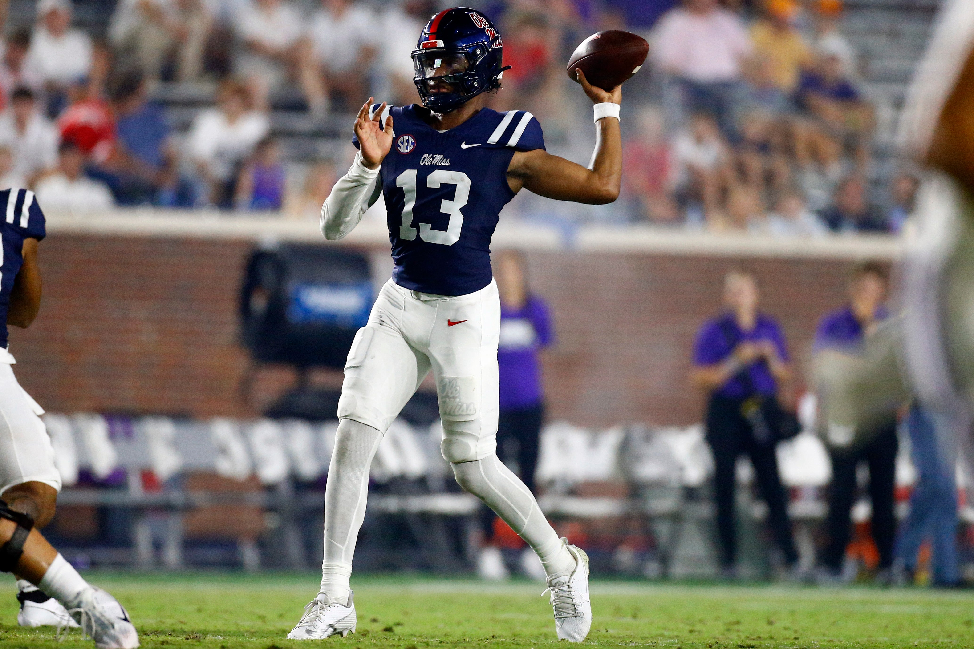Austin Simmons makes a throw for the Ole Miss Rebels at quarterback
