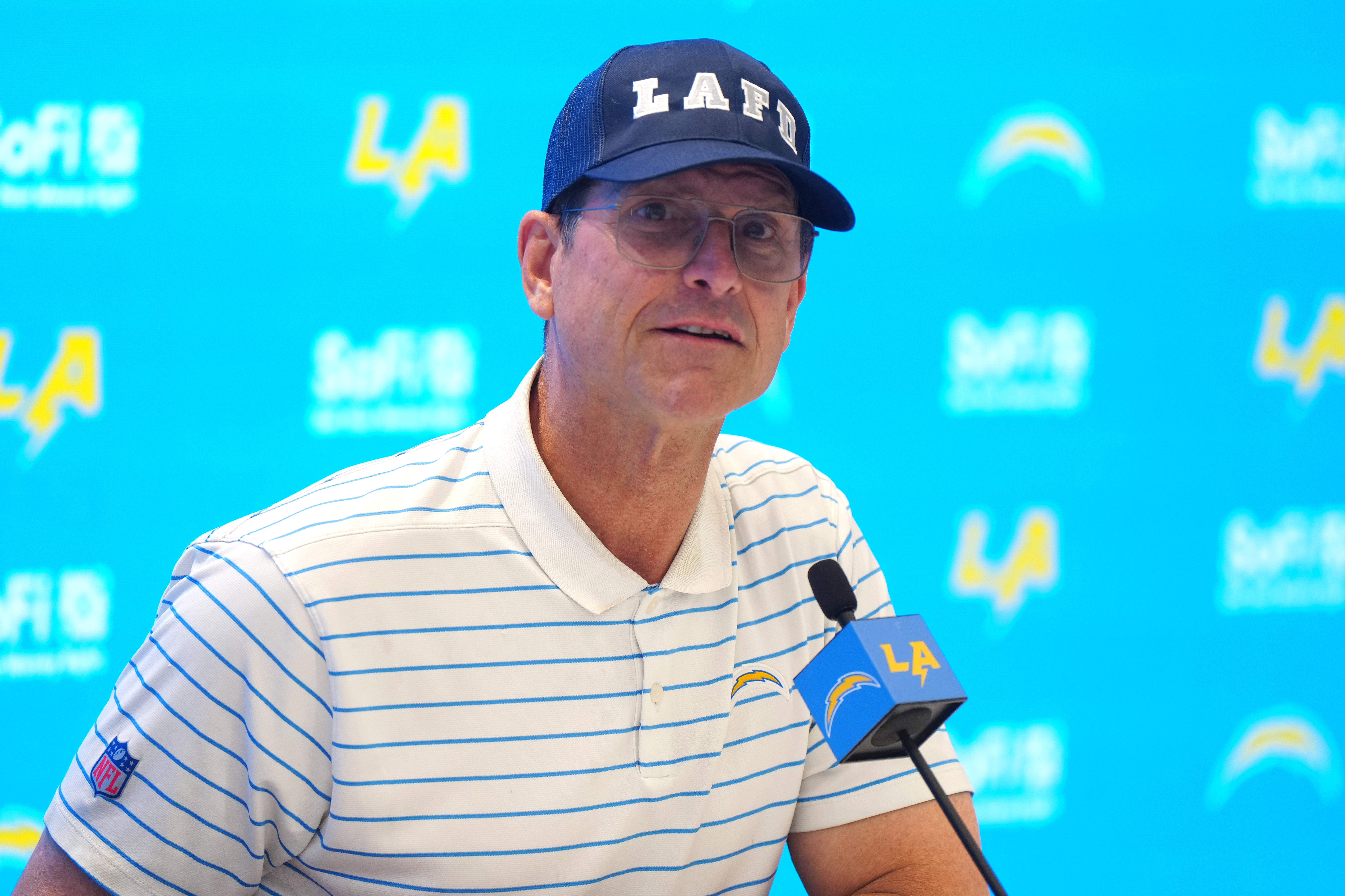 Jan 15, 2025; El Segundo, CA, USA; Los Angeles Chargers coach Jim Harbaugh at a press conference at The Bolt.