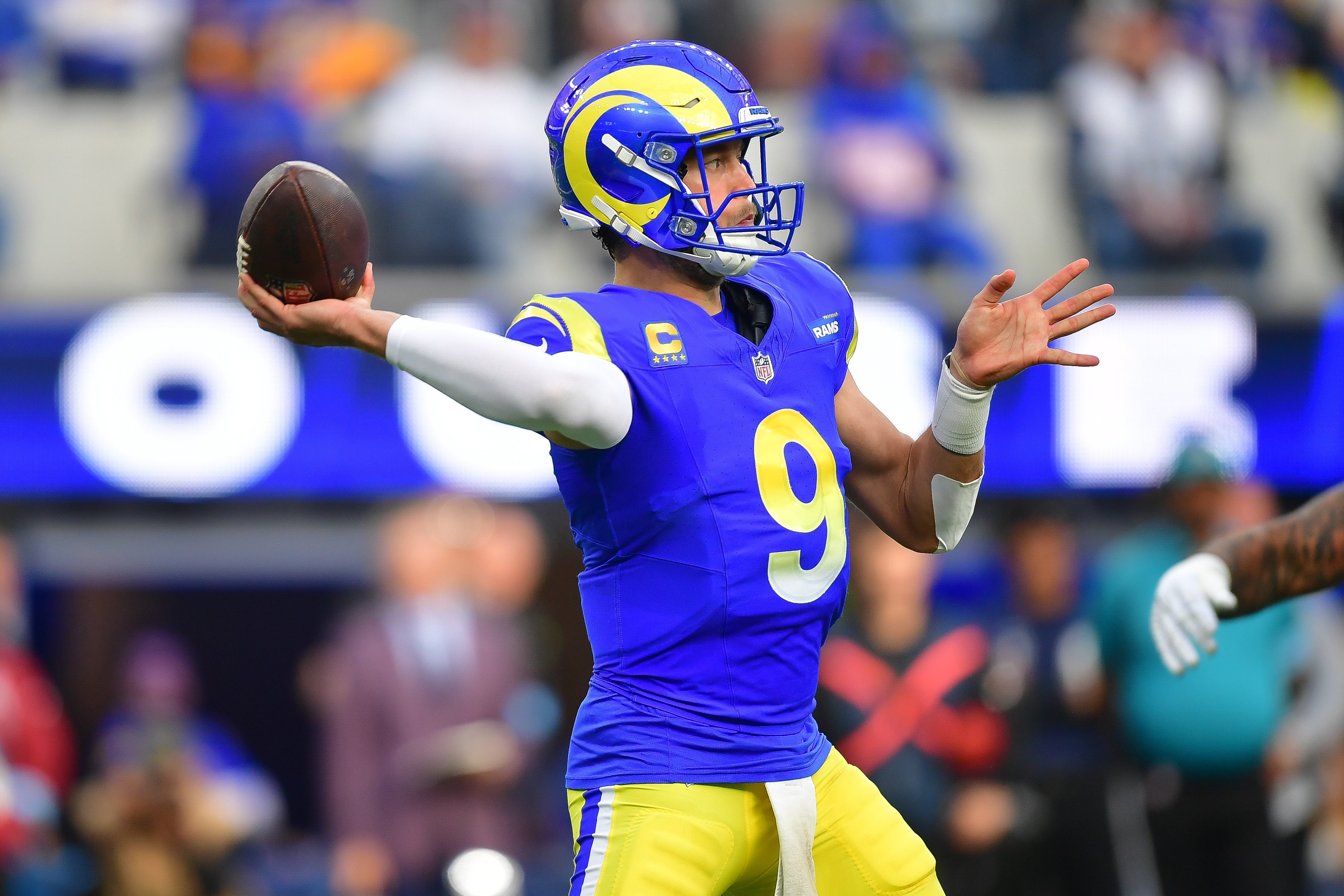 Rams quarterback Matthew Stafford (9) throws against the Bills during the first half at SoFi Stadium.