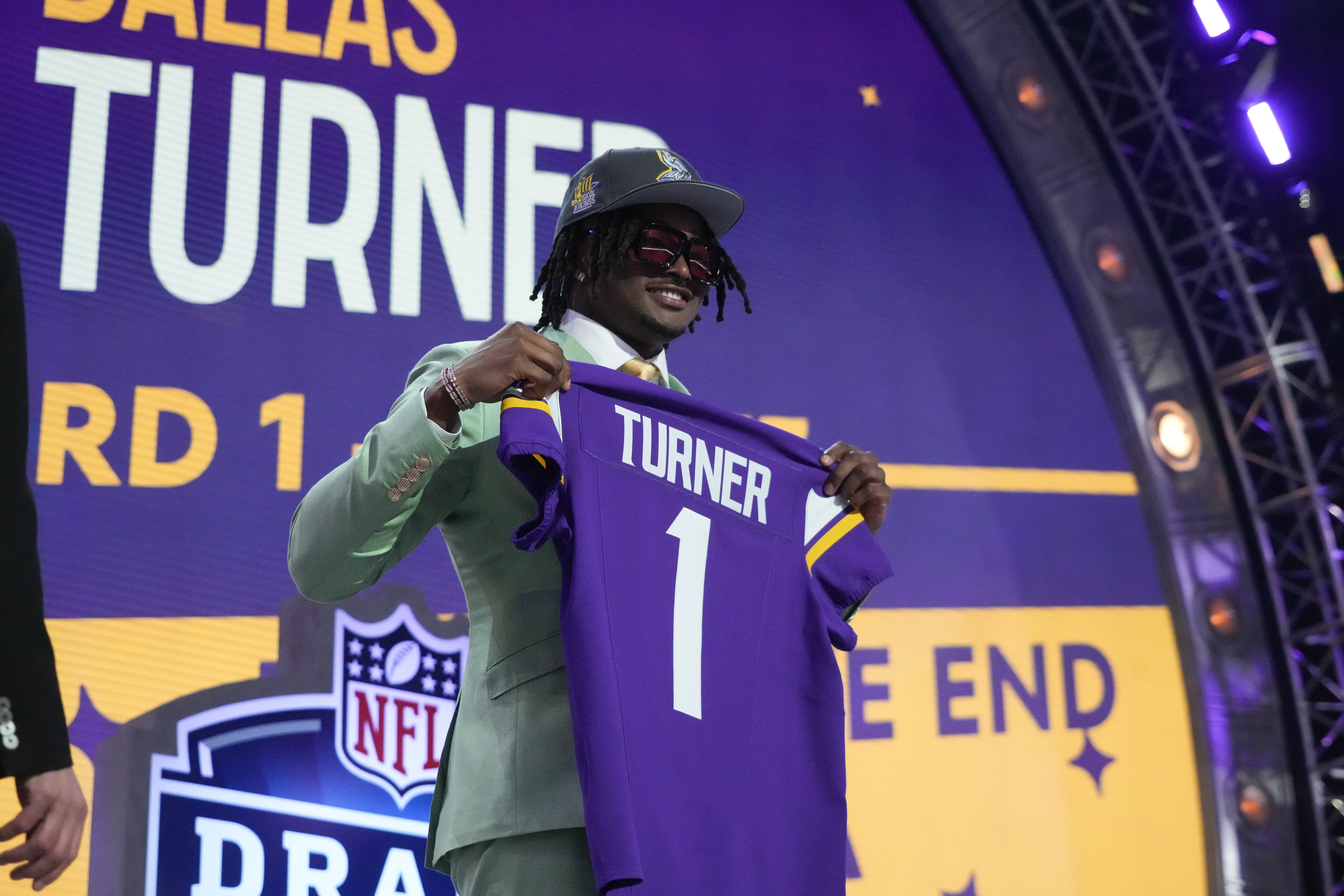 Apr 25, 2024; Detroit, MI, USA; Alabama Crimson Tide linebacker Dallas Turner poses after being selected by the Minnesota Vikings as the No. 17 pick in the first round of the 2024 NFL Draft at Campus Martius Park and Hart Plaza.