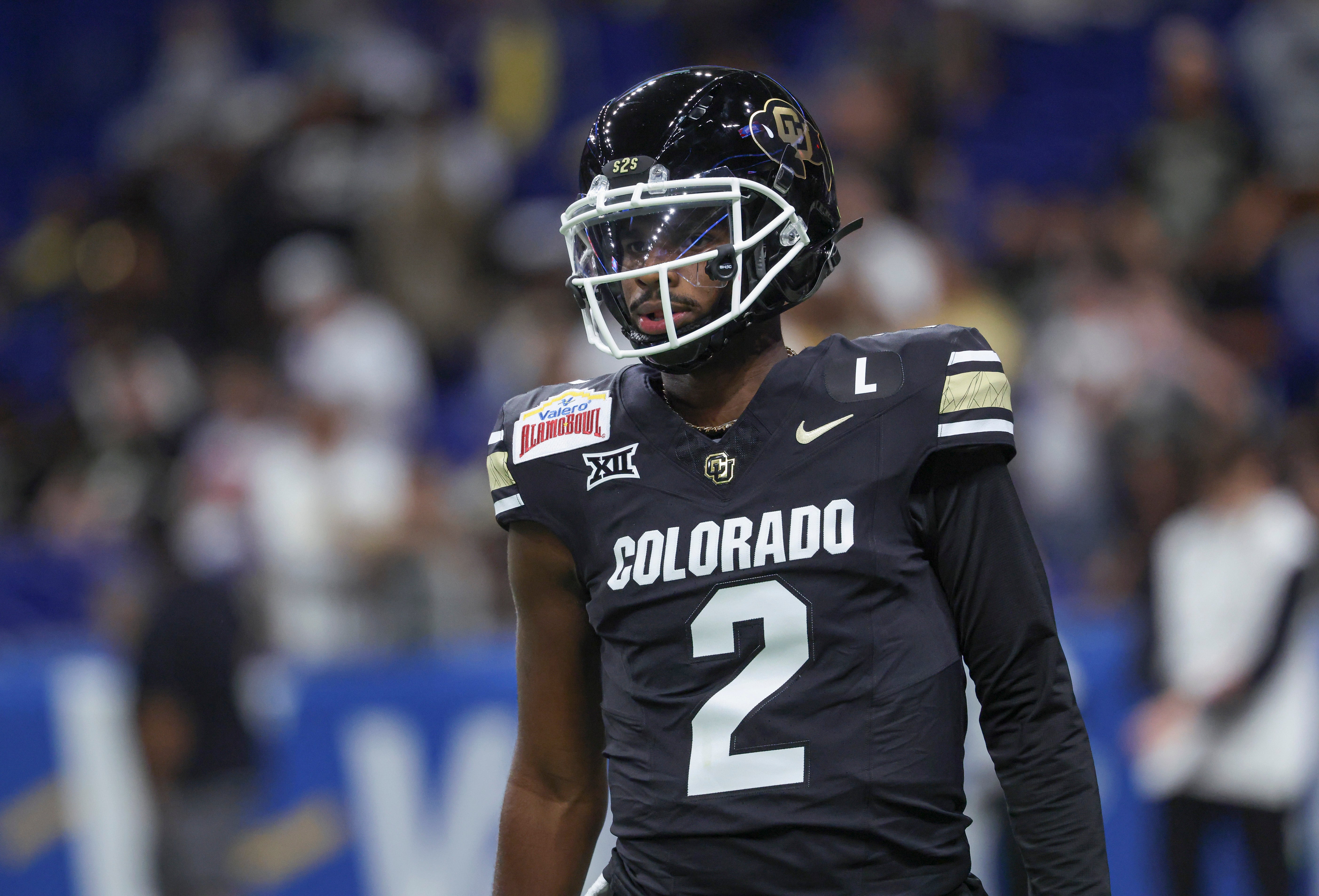 Dec 28, 2024; San Antonio, TX, USA; Colorado Buffaloes quarterback Shedeur Sanders (2) warms up before the game against the Brigham Young Cougars at Alamodome.
