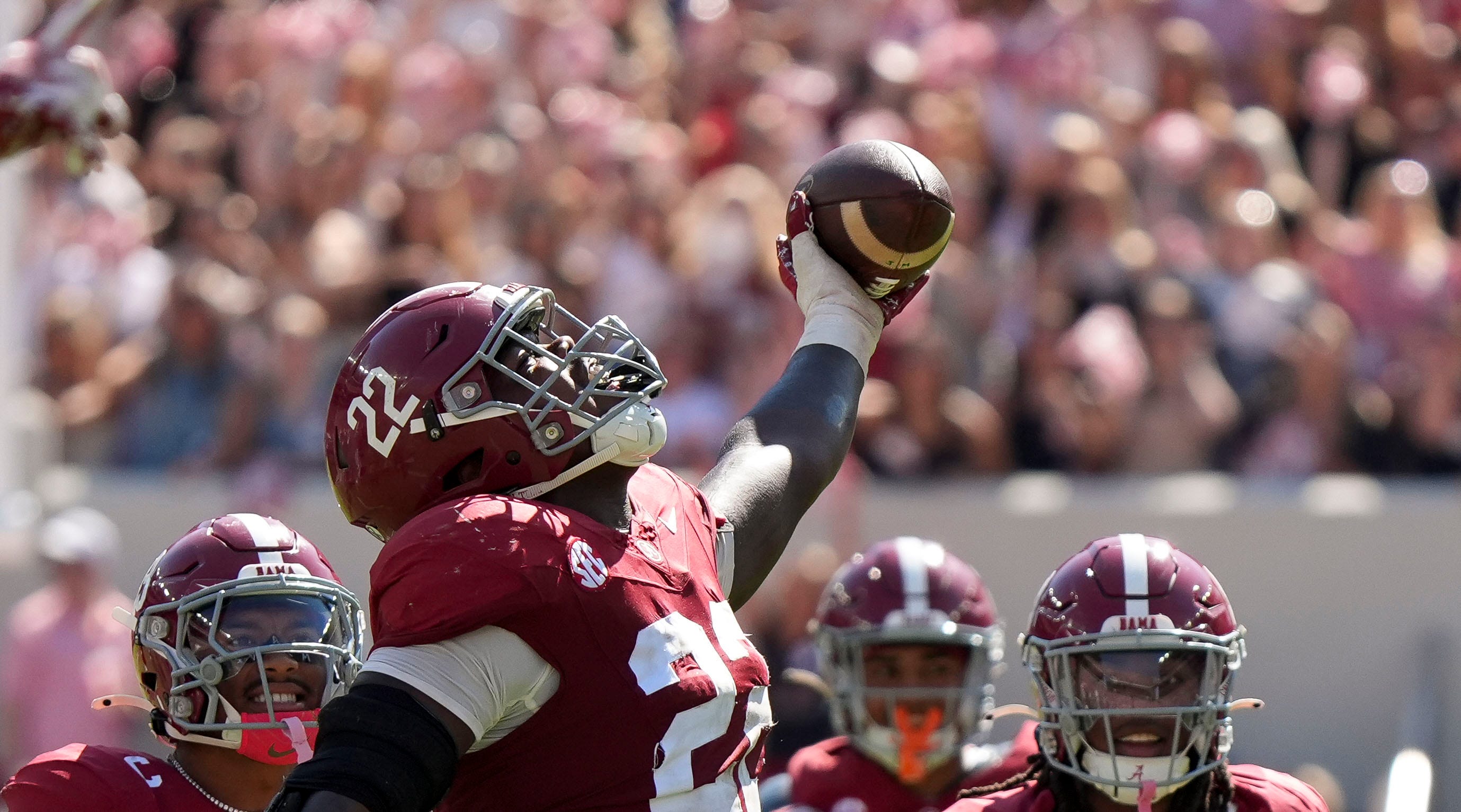 Oct 12, 2024; Tuscaloosa, Alabama, USA; Alabama Crimson Tide defensive lineman LT Overton (22) celebrates after recovering a South Carolina fumble at Bryant-Denny Stadium. Alabama defeated South Carolina 27-25.