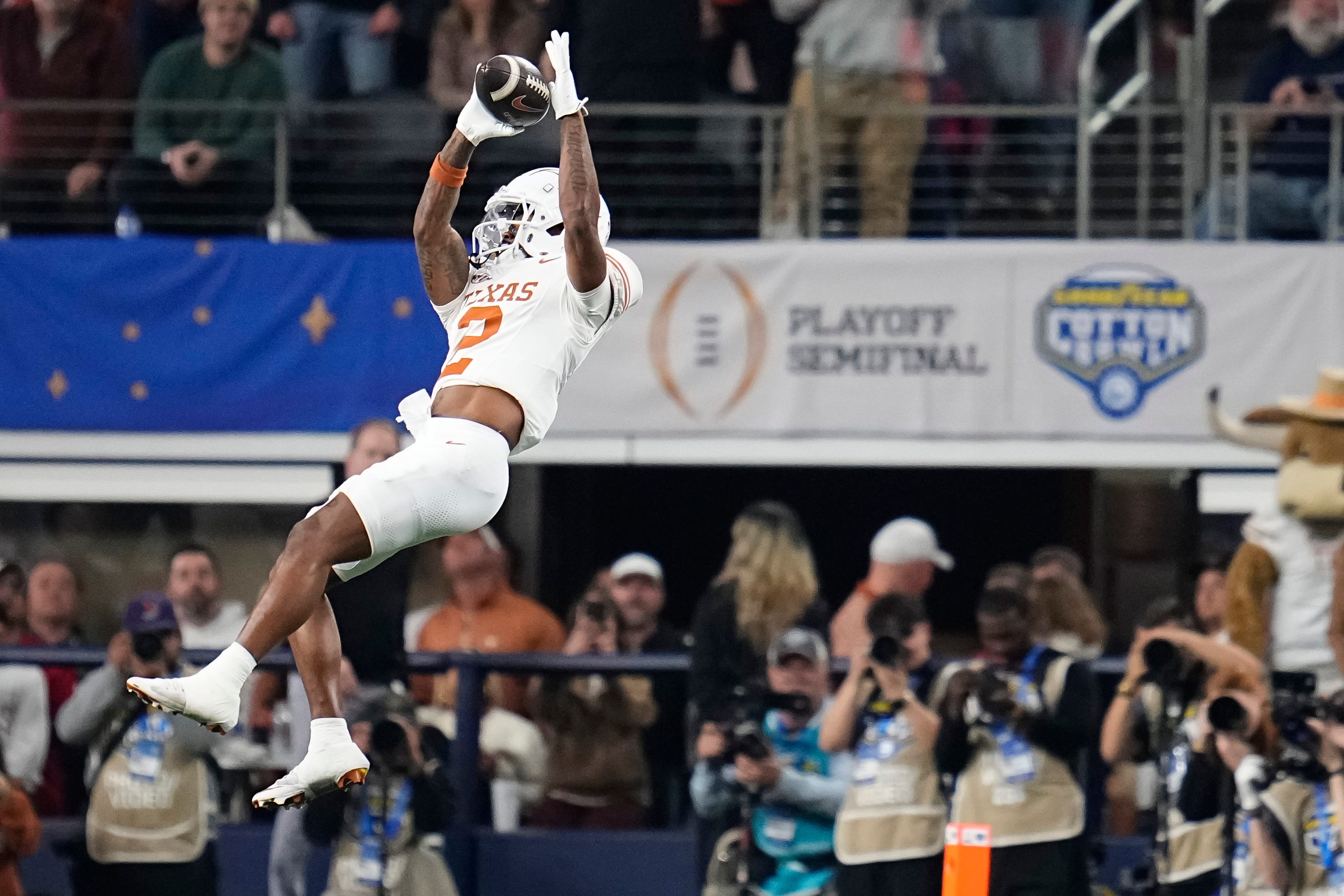 Texas Longhorns wide receiver Matthew Golden (2) catches a pass during the second half of the Cotton Bowl Classic College Football Playoff semifinal game against the Ohio State Buckeyes at AT&T Stadium in Arlington, Texas on Jan. 10, 2025. Ohio State won 28-14.