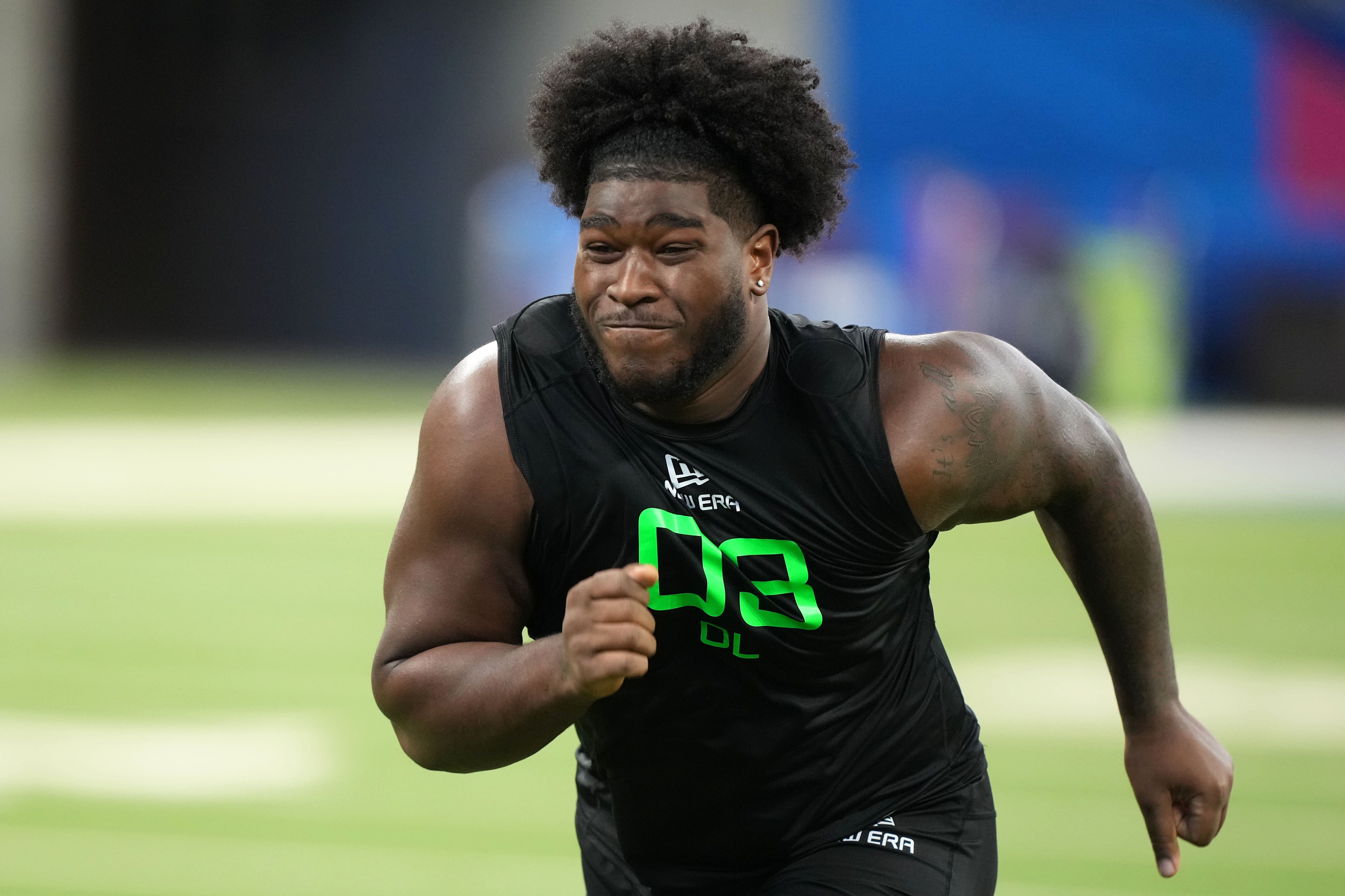 Mar 2, 2025; Indianapolis, IN, USA; Alabama offensive lineman Tyler Booker (OL03) during the 2025 NFL Combine at Lucas Oil Stadium. Mandatory Credit: Kirby Lee-Imagn Images